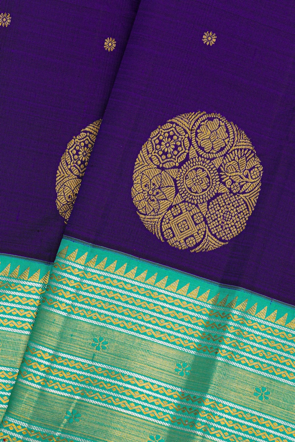 Kancheepuram Silk Royal Blue Saree With Florals And Buttis Body And Contrast Zig-Zag Lines And Florals Border