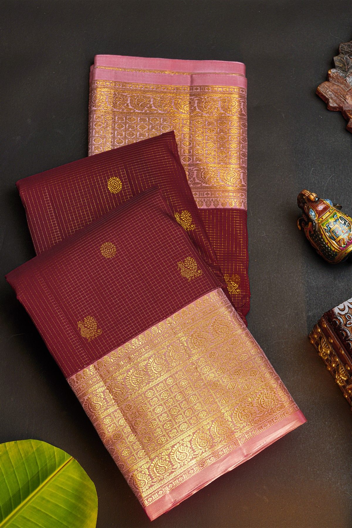 Kancheepuram Silk Maroon Saree With Florals And Peacocks In Checks Body And Contrast Florals And Peacocks Border