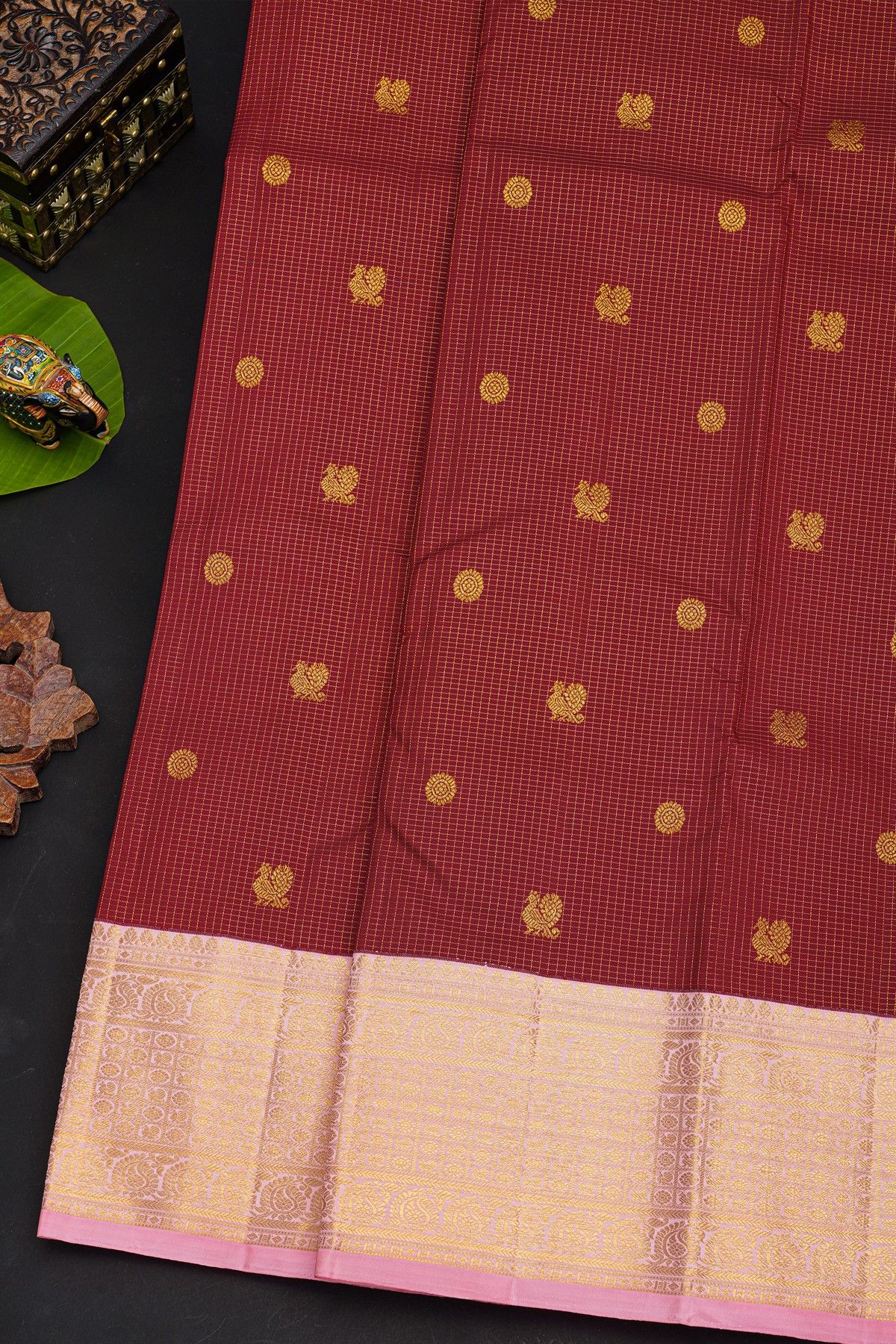 Kancheepuram Silk Maroon Saree With Florals And Peacocks In Checks Body And Contrast Florals And Peacocks Border