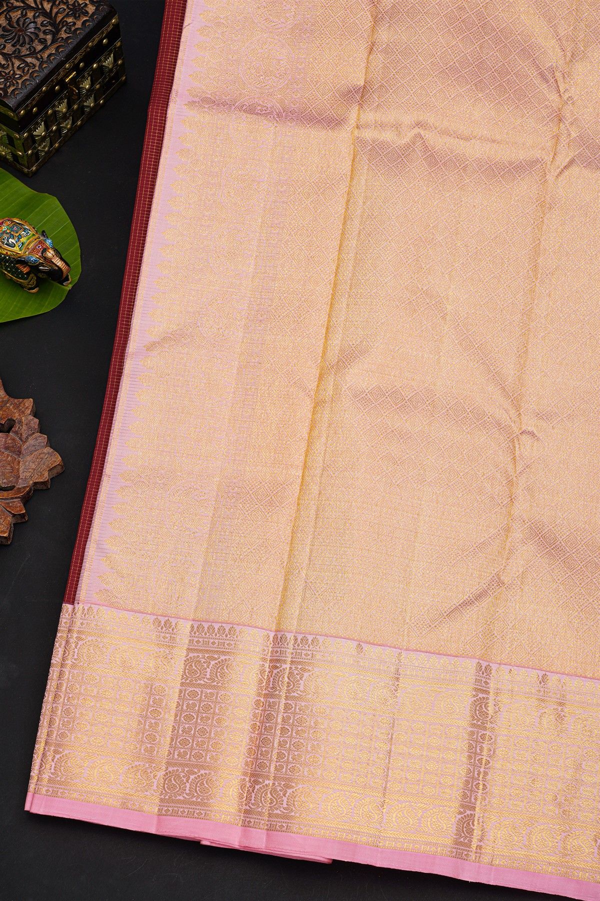 Kancheepuram Silk Maroon Saree With Florals And Peacocks In Checks Body And Contrast Florals And Peacocks Border