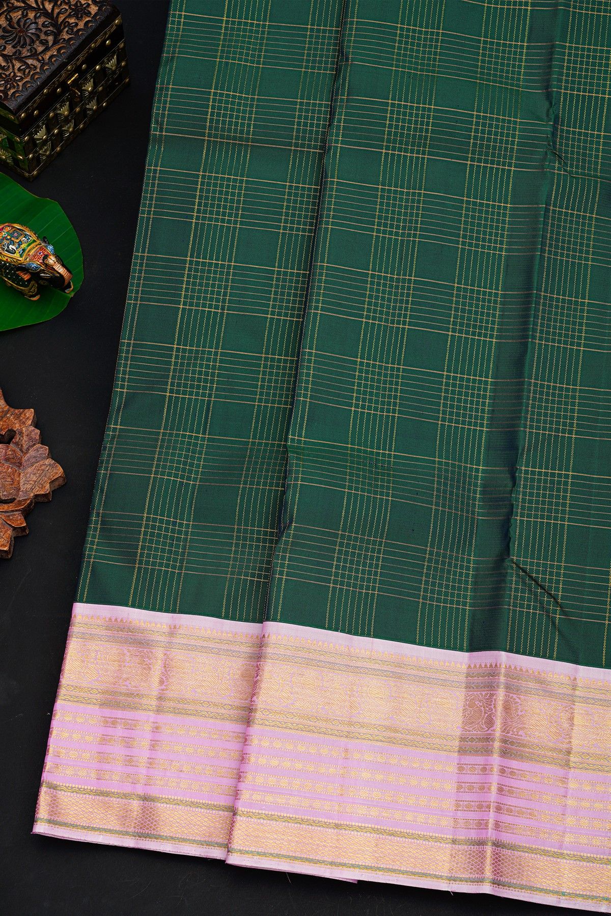 Kancheepuram Silk Bottle Green Saree With Zari Checks Body And Contrast Florals And Peacocks Border
