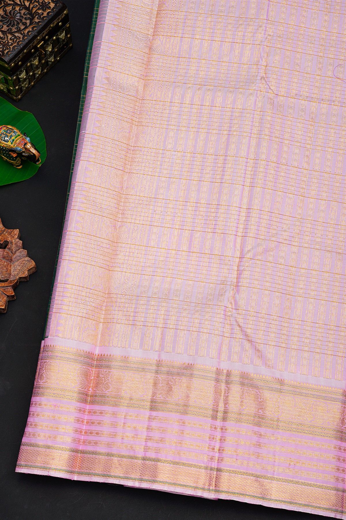 Kancheepuram Silk Bottle Green Saree With Zari Checks Body And Contrast Florals And Peacocks Border