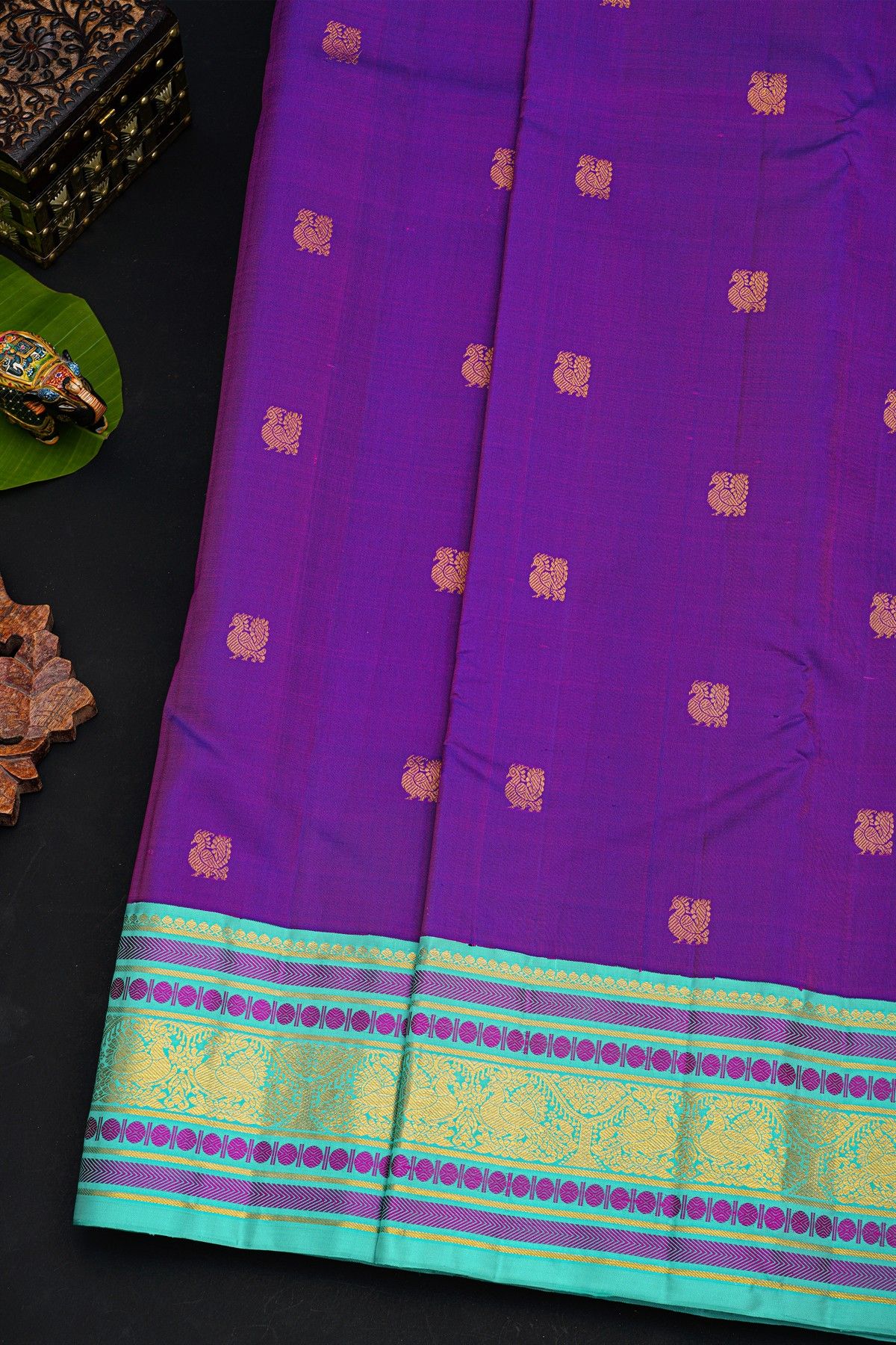 Kancheepuram Silk Dual Colour Saree With Peacock Buttis Body And Contrast Florals And Peacocks Border