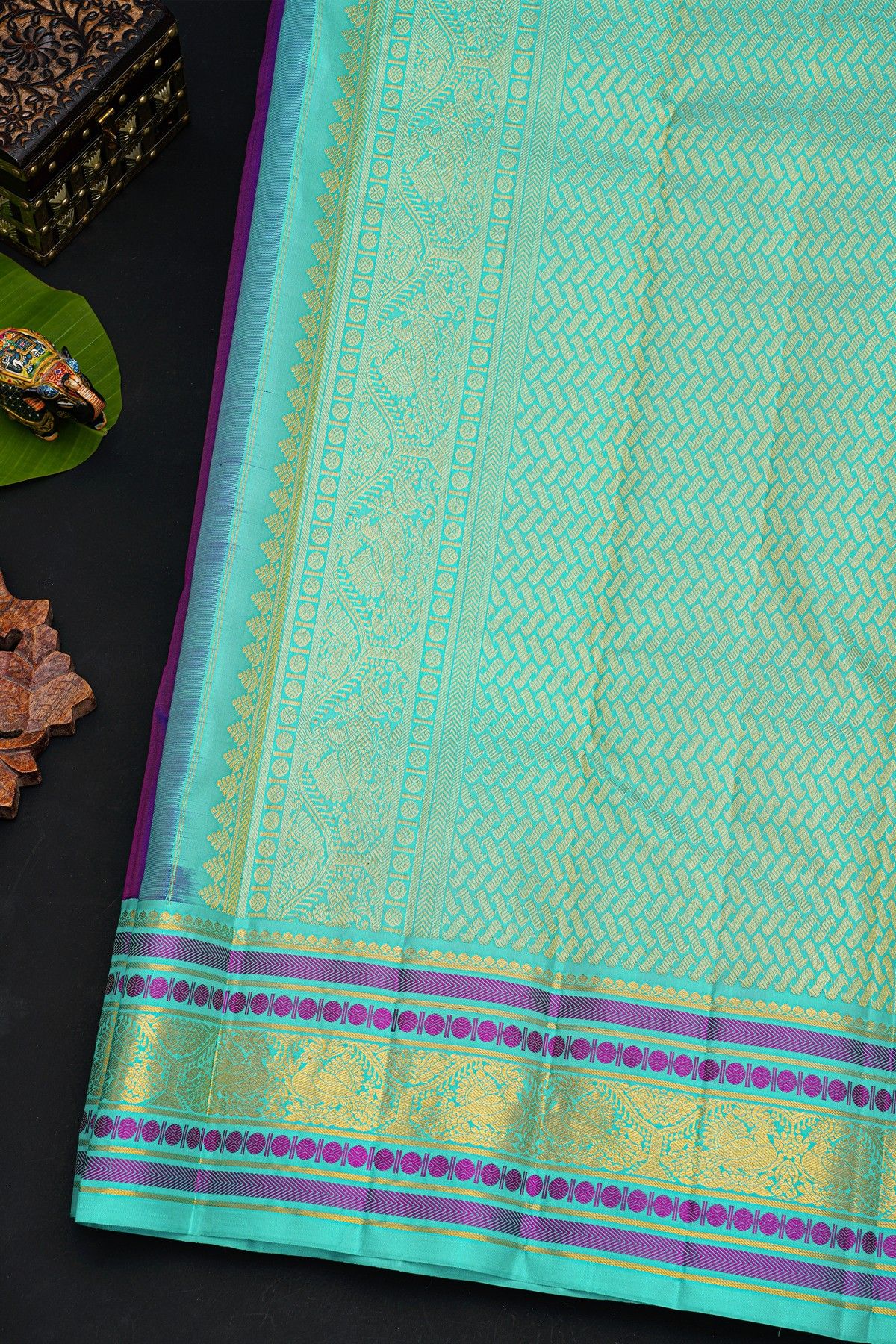 Kancheepuram Silk Dual Colour Saree With Peacock Buttis Body And Contrast Florals And Peacocks Border