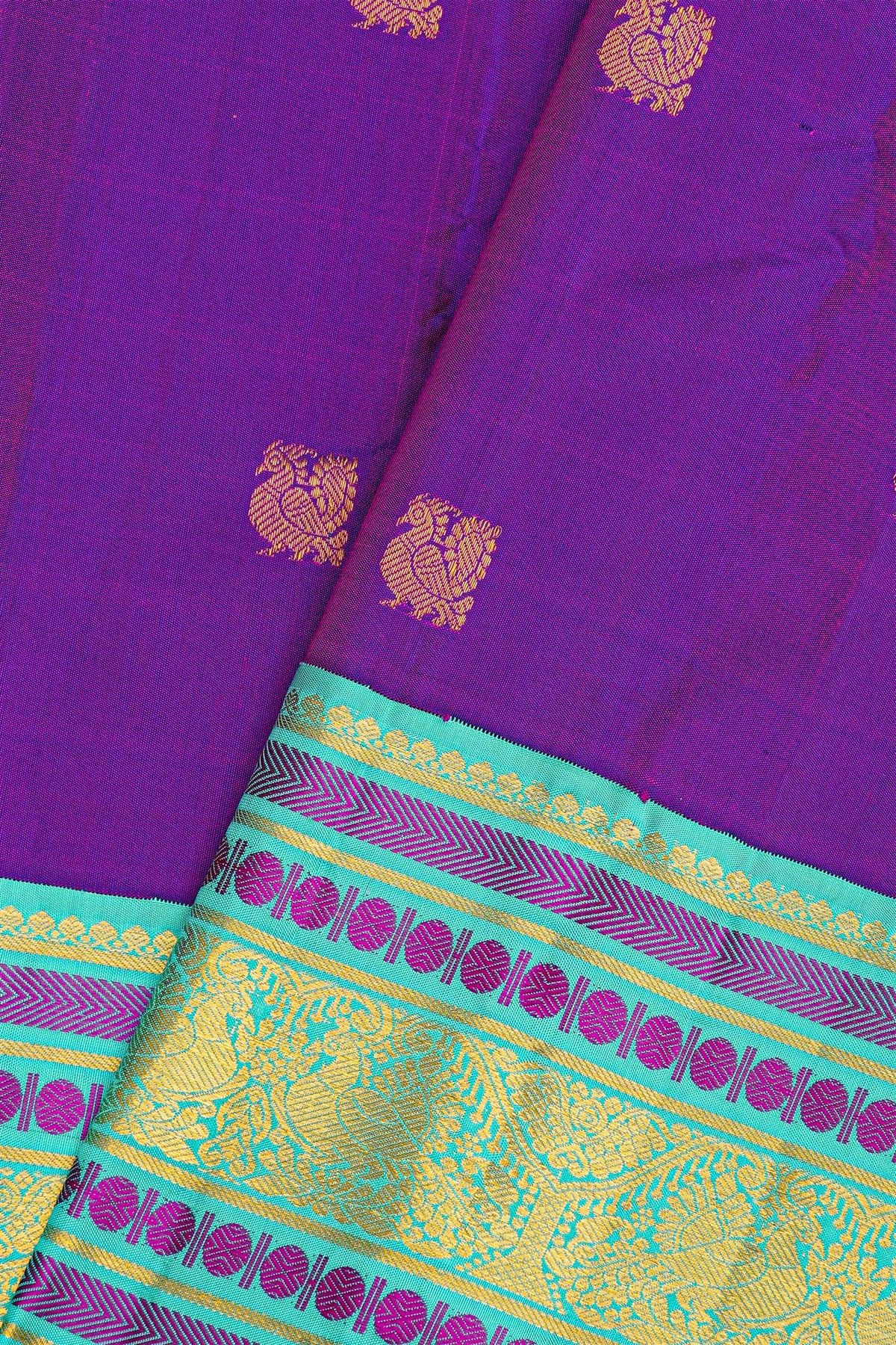 Kancheepuram Silk Dual Colour Saree With Peacock Buttis Body And Contrast Florals And Peacocks Border