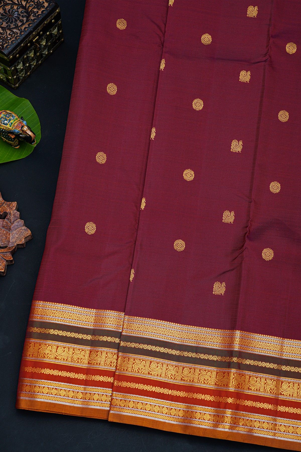 Kancheepuram Silk Wine Saree With Florals And Peacocks Body And Contrast Florals And Peacocks Border