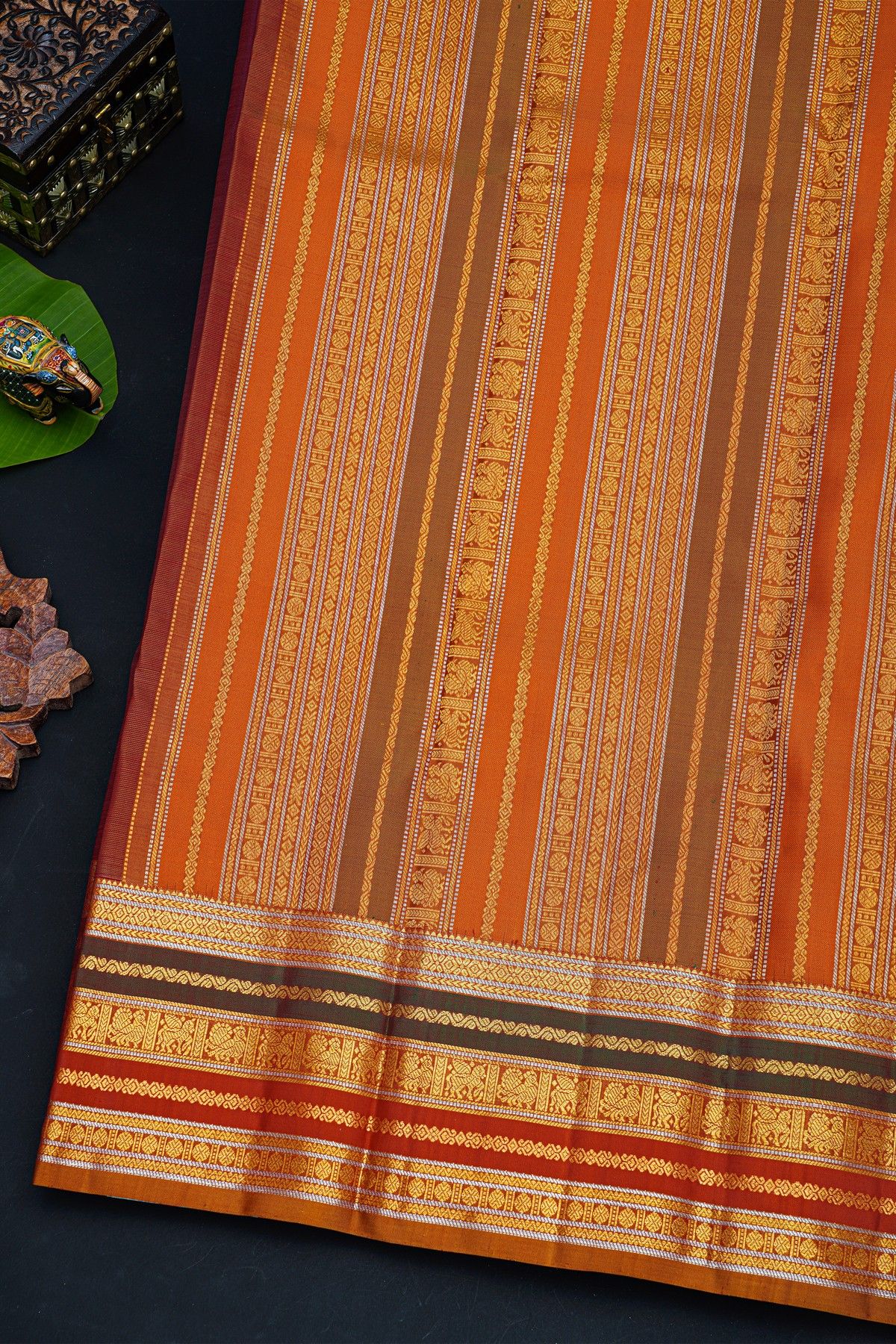 Kancheepuram Silk Wine Saree With Florals And Peacocks Body And Contrast Florals And Peacocks Border