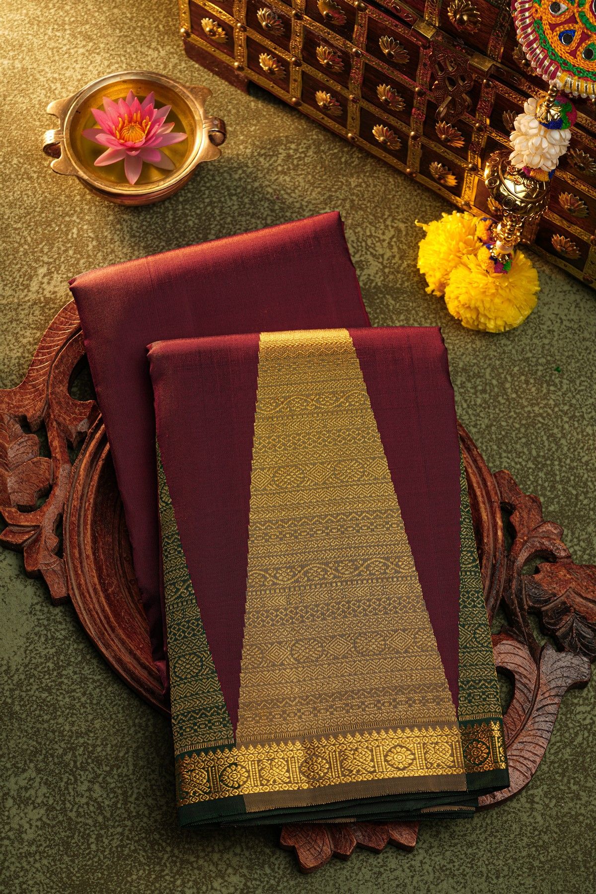 Kancheepuram Silk Wine Saree With Large Temple Motifs And Traditional Zari Border
