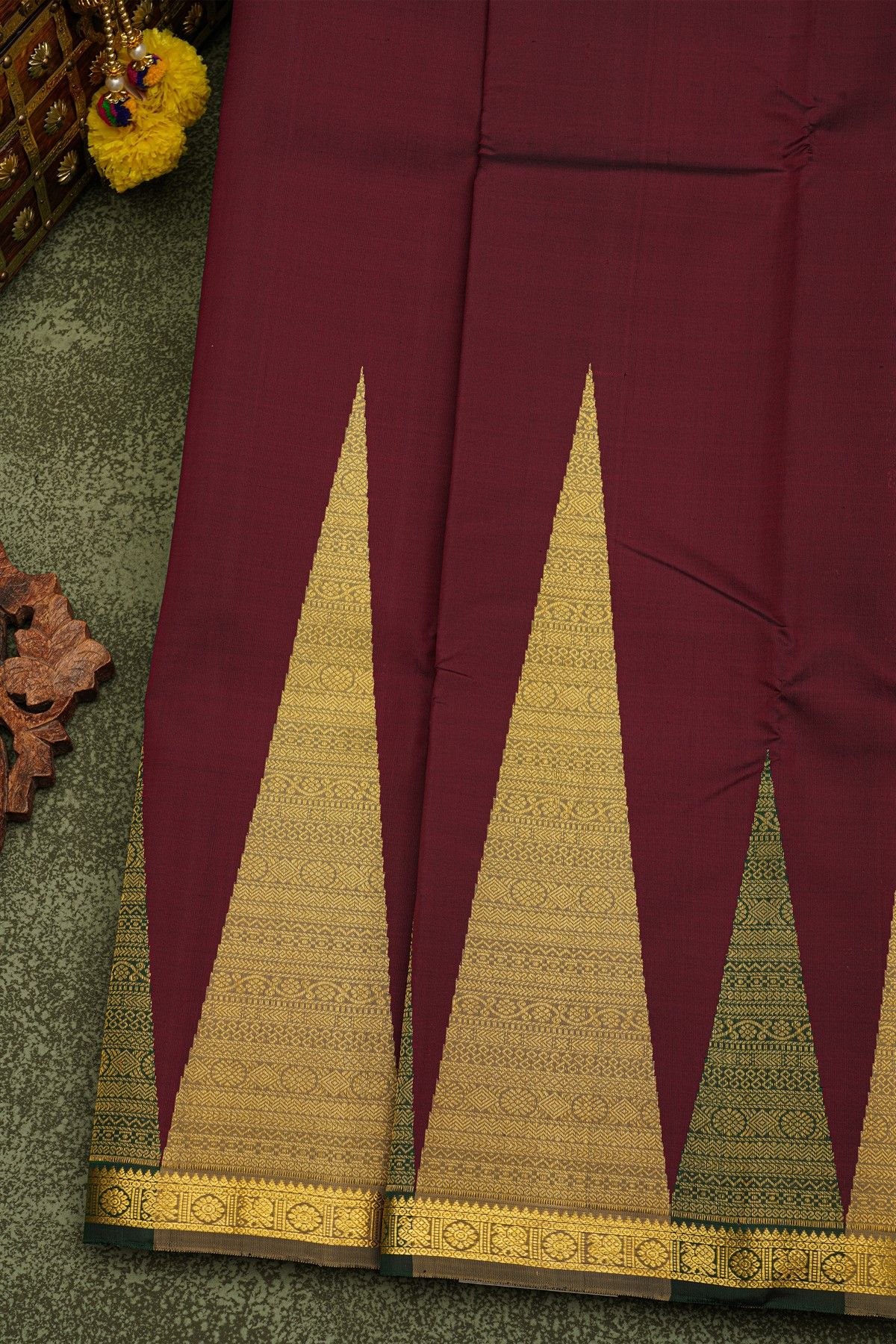 Kancheepuram Silk Wine Saree With Large Temple Motifs And Traditional Zari Border
