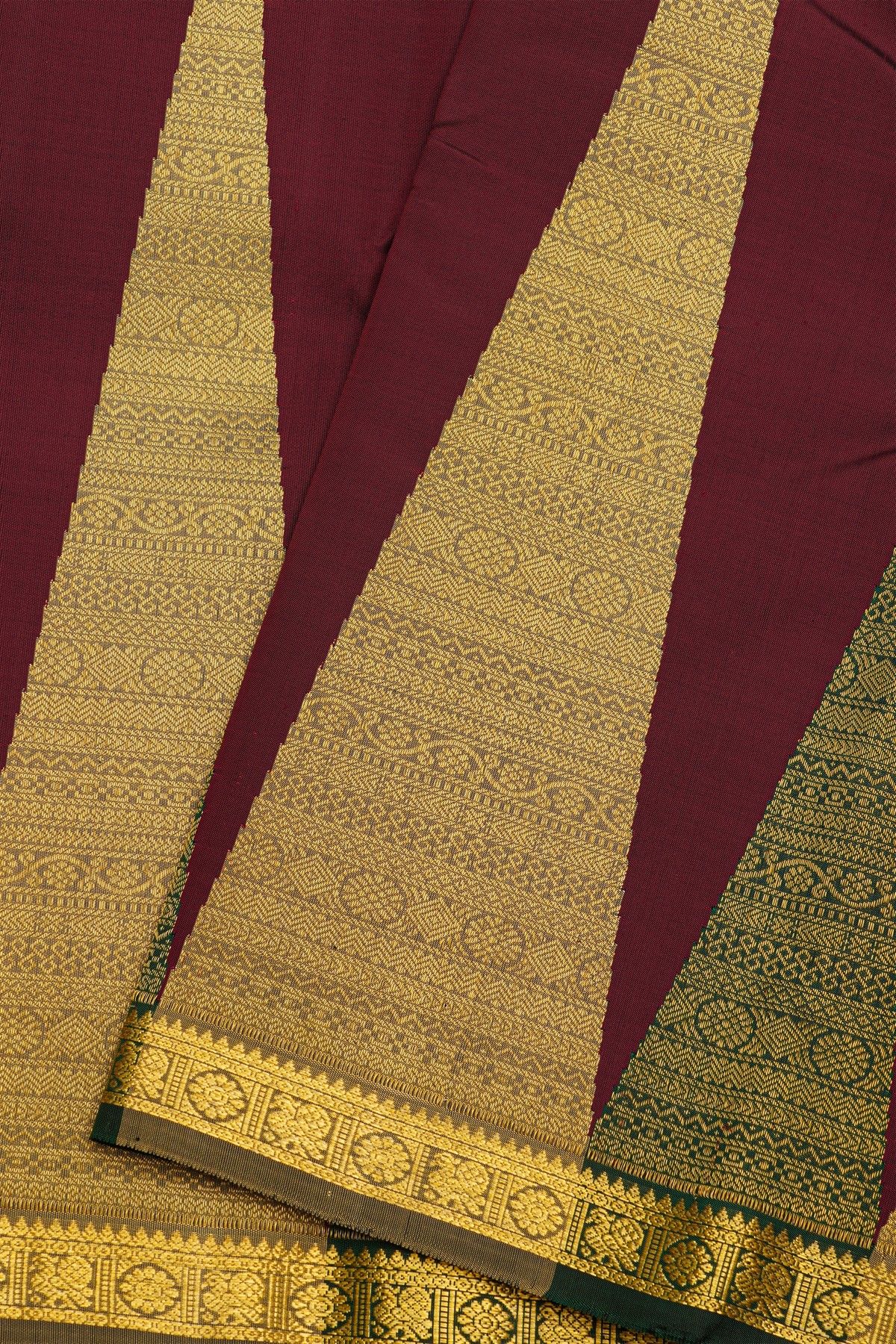 Kancheepuram Silk Wine Saree With Large Temple Motifs And Traditional Zari Border