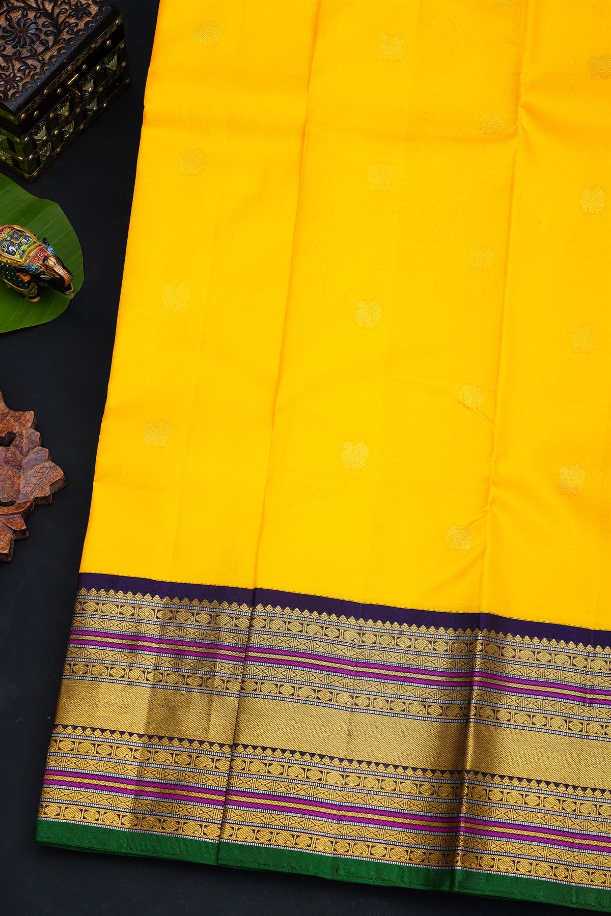 Kancheepuram Silk Yellow Saree With Gold Buttas And Peacock And Elephant Motif Kaddi Zari Border