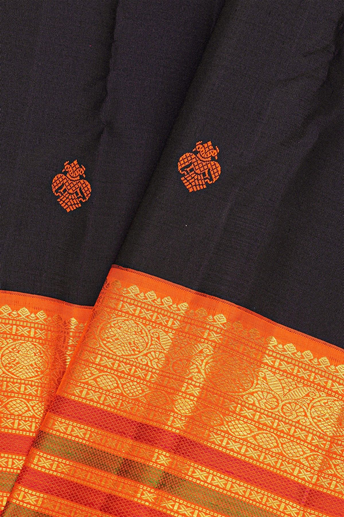 Kancheepuram Silk Black Saree With Orange Buttas And Traditional Zari Border