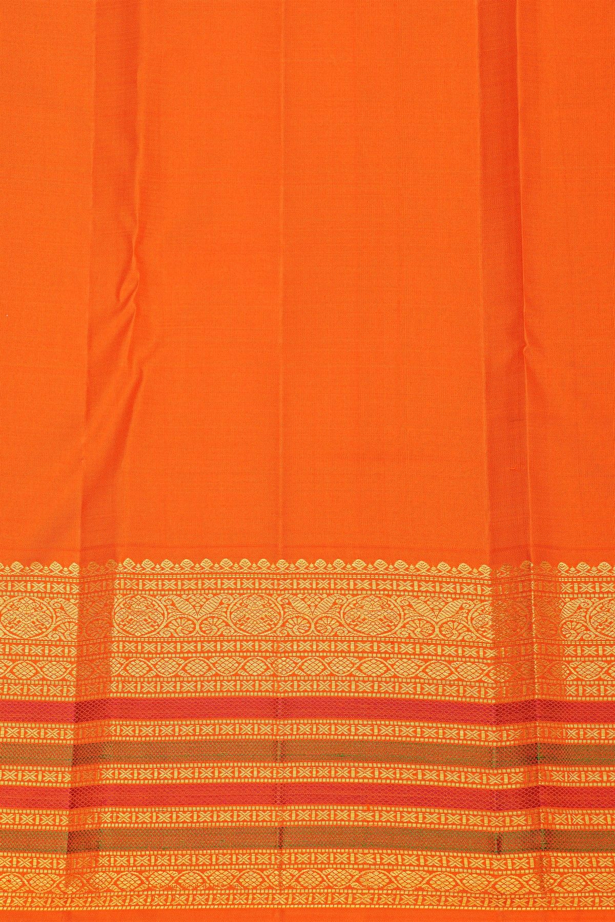 Kancheepuram Silk Black Saree With Orange Buttas And Traditional Zari Border