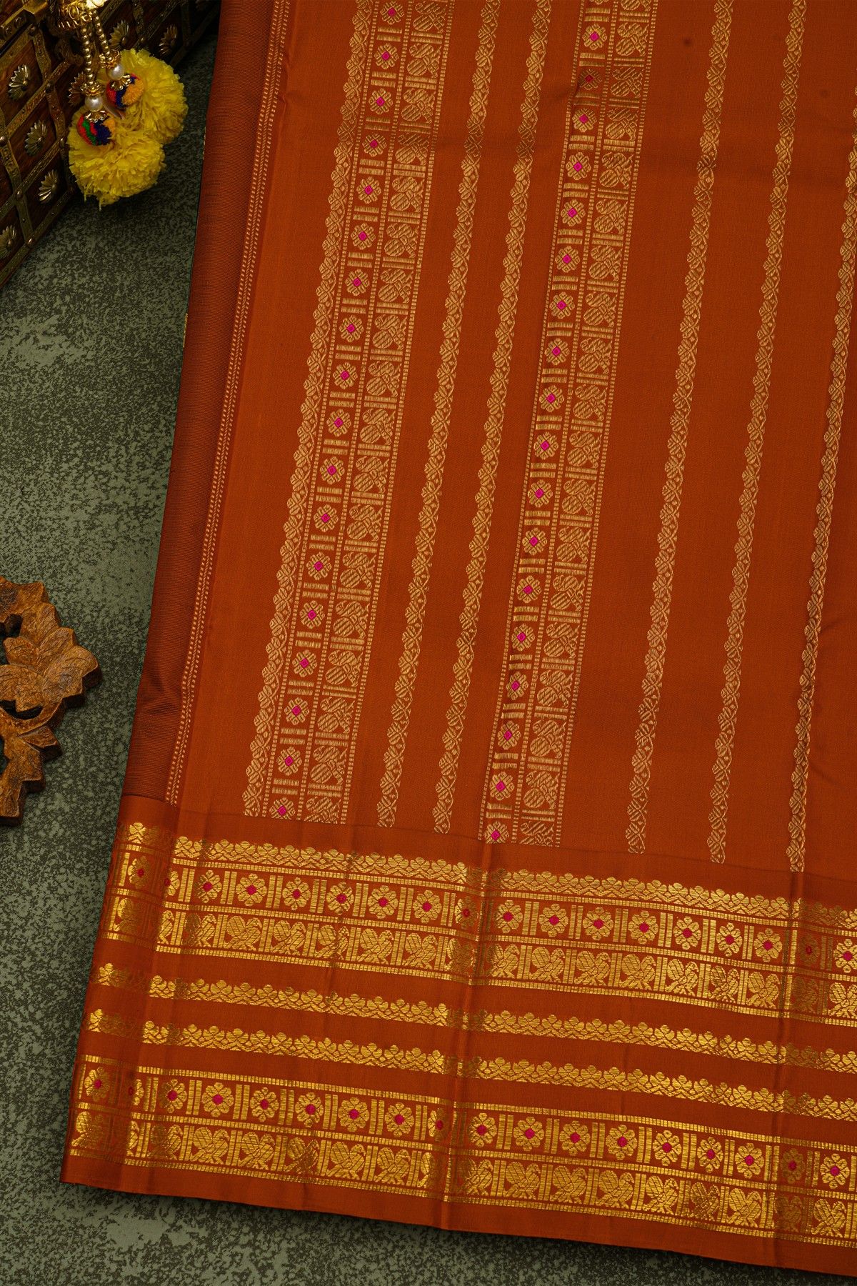 Kancheepuram Silk Black Saree With Gold Buttas And Rich Orange Traditional Zari Border