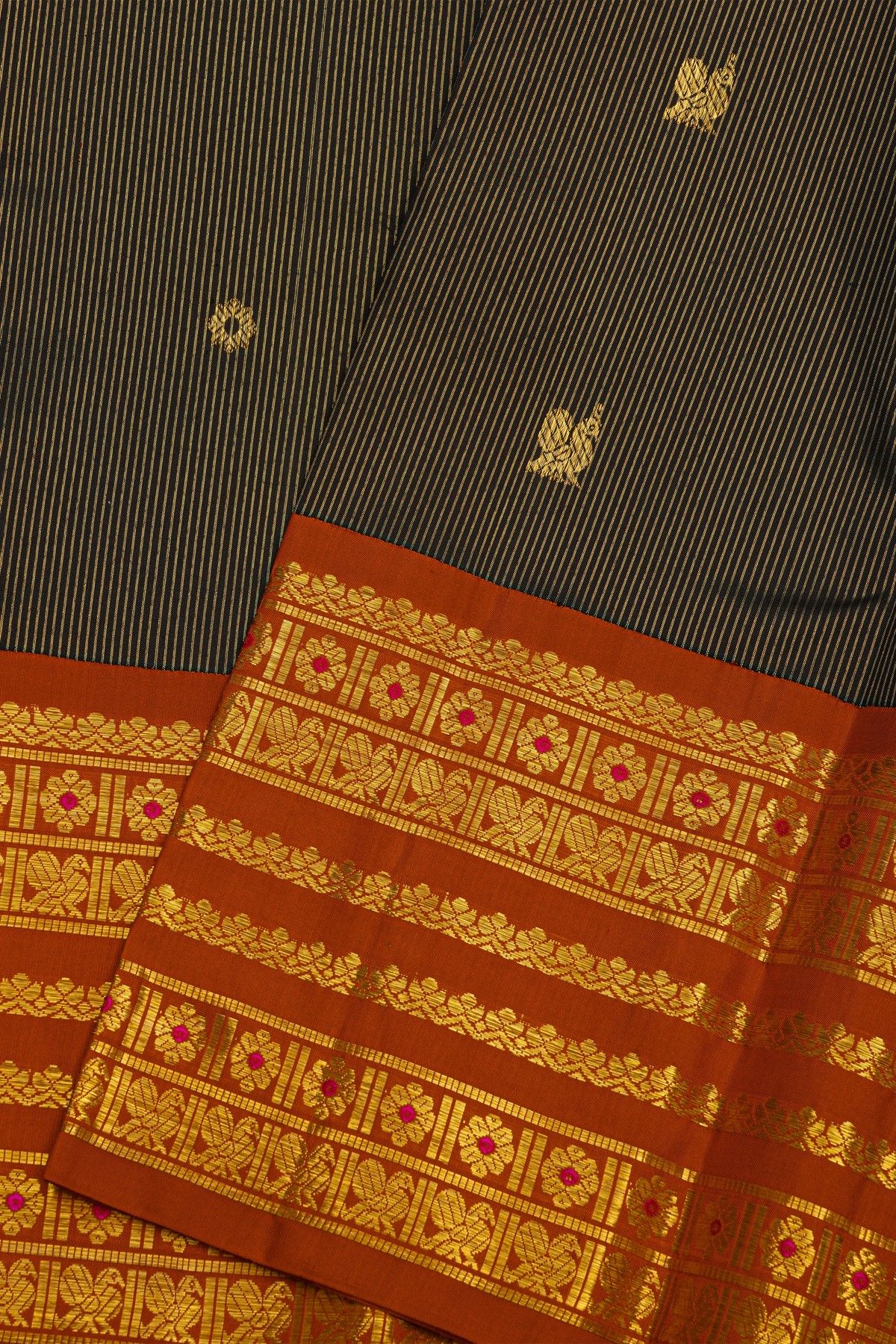 Kancheepuram Silk Black Saree With Gold Buttas And Rich Orange Traditional Zari Border