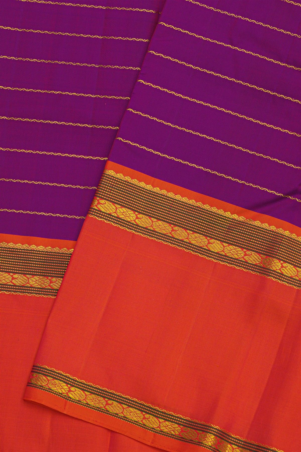 Kancheepuram Silk Dark Purple Saree WIth Gap Border Motifs