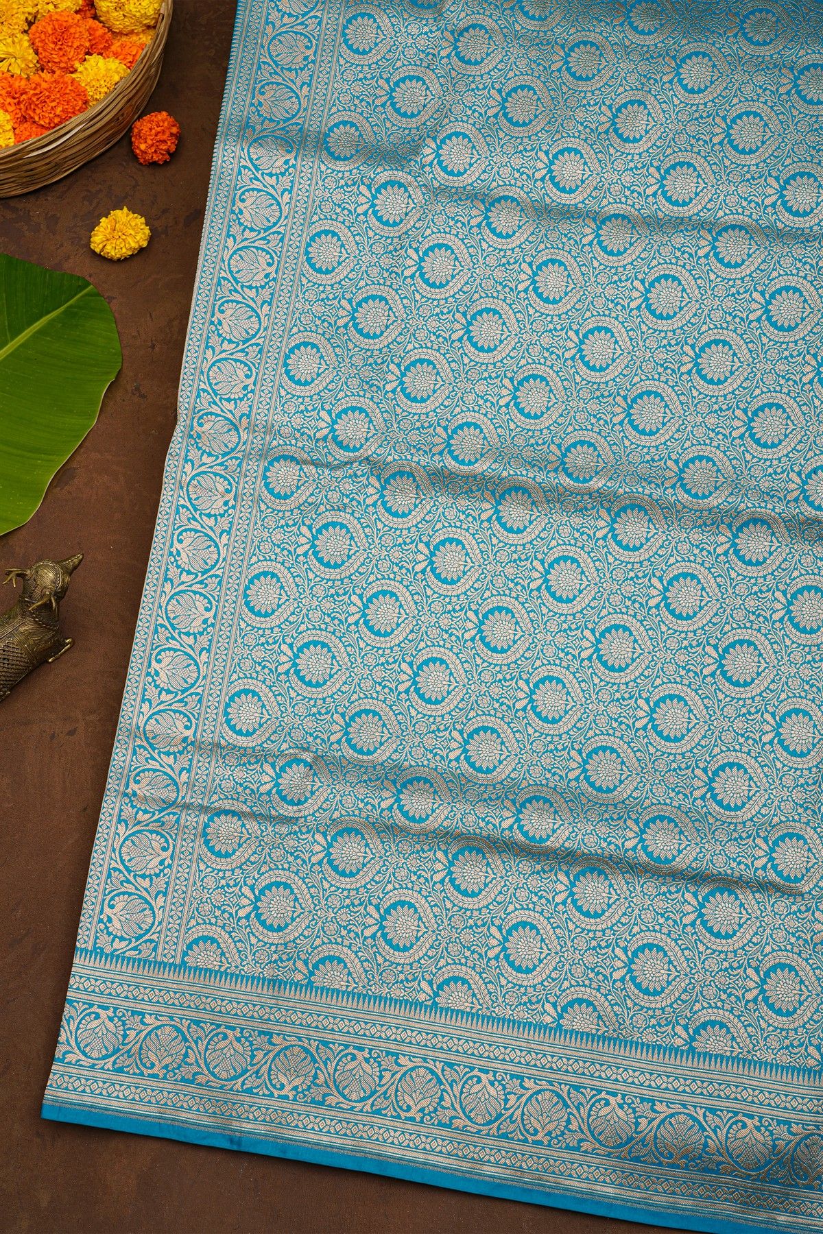 Banarasi Silk Sky Blue Saree With Florals And Leaves Jaal Border