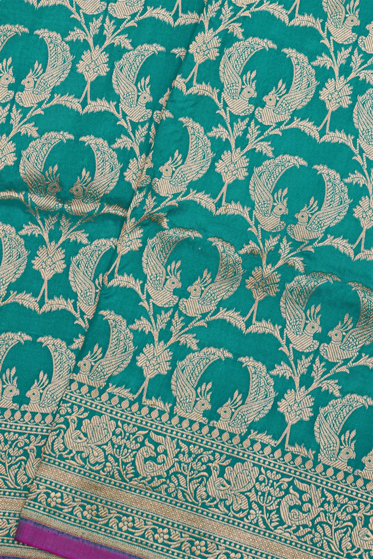Banarasi Silk Teal Blue Saree With Florals And Pecocks Body