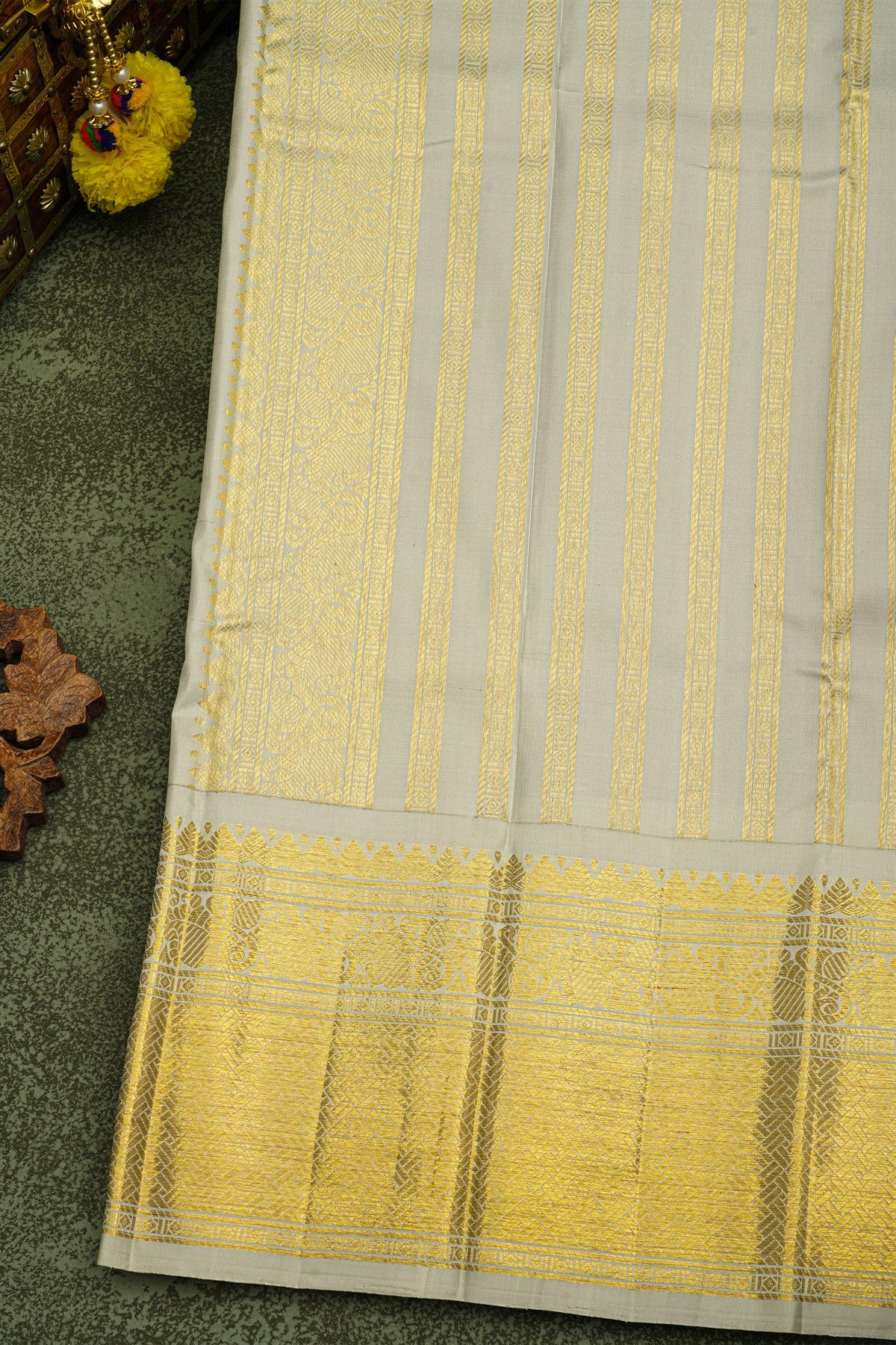 Kancheepuram Silk Purple Saree With Gold Buttas And Brown Zari Border With Traditional Woven Motifs