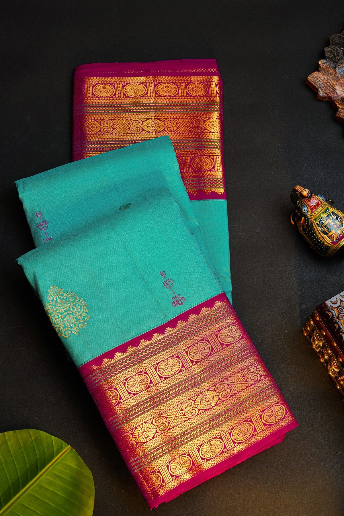 Kancheepuram Silk Sky Blue Saree With Florals And Buttis Body And Contrast Florals And Buttis Border