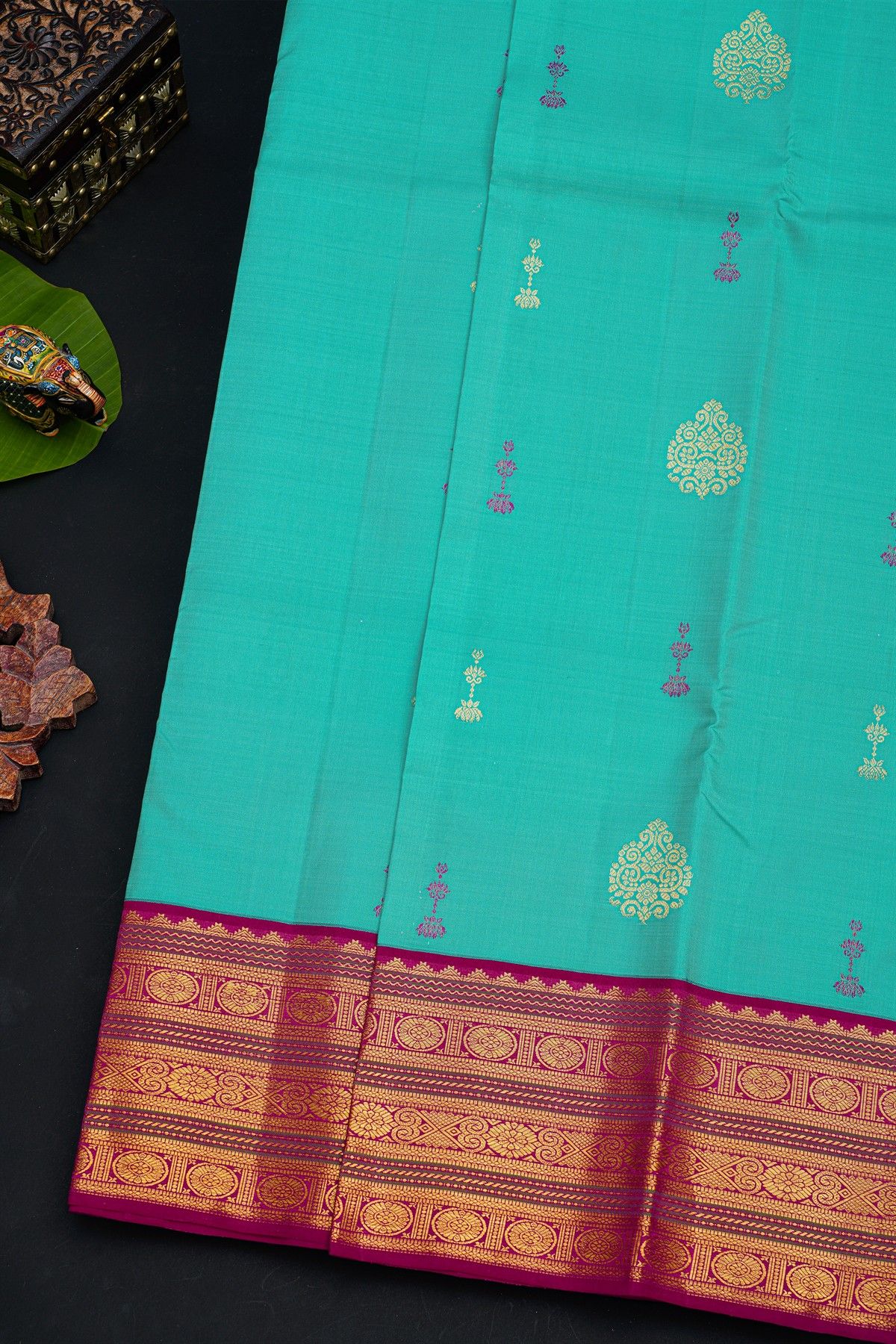 Kancheepuram Silk Sky Blue Saree With Florals And Buttis Body And Contrast Florals And Buttis Border