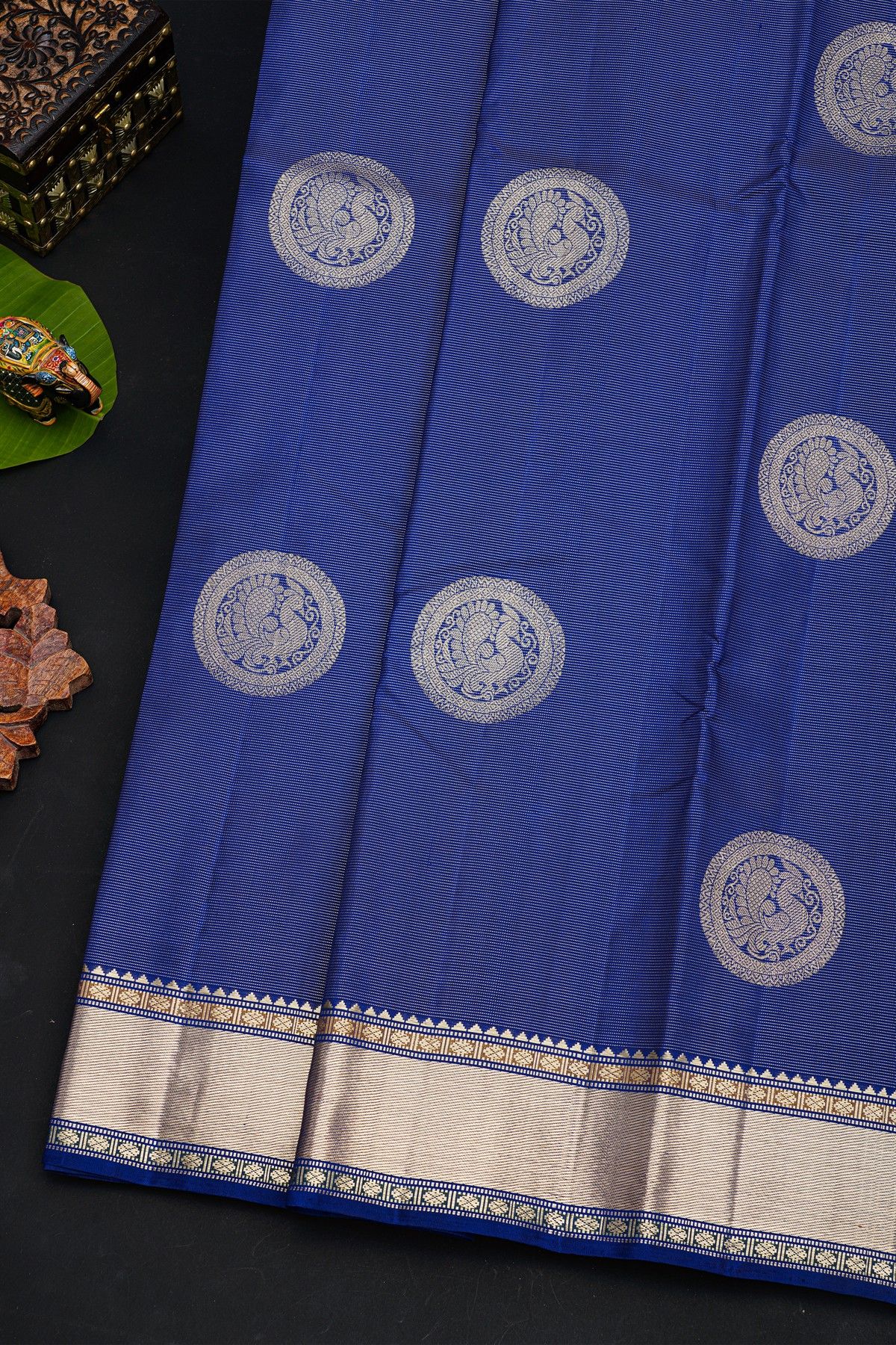 Kancheepuram Silk Royal Blue Saree With Florals In Circles Body And Self Cross Lines Border