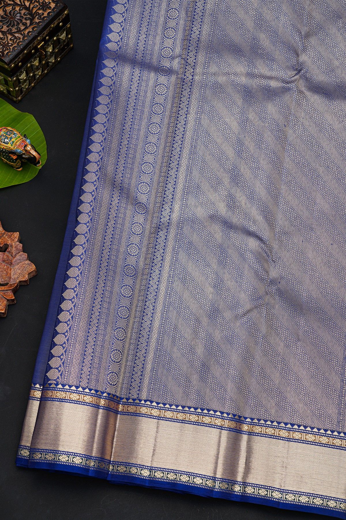 Kancheepuram Silk Royal Blue Saree With Florals In Circles Body And Self Cross Lines Border
