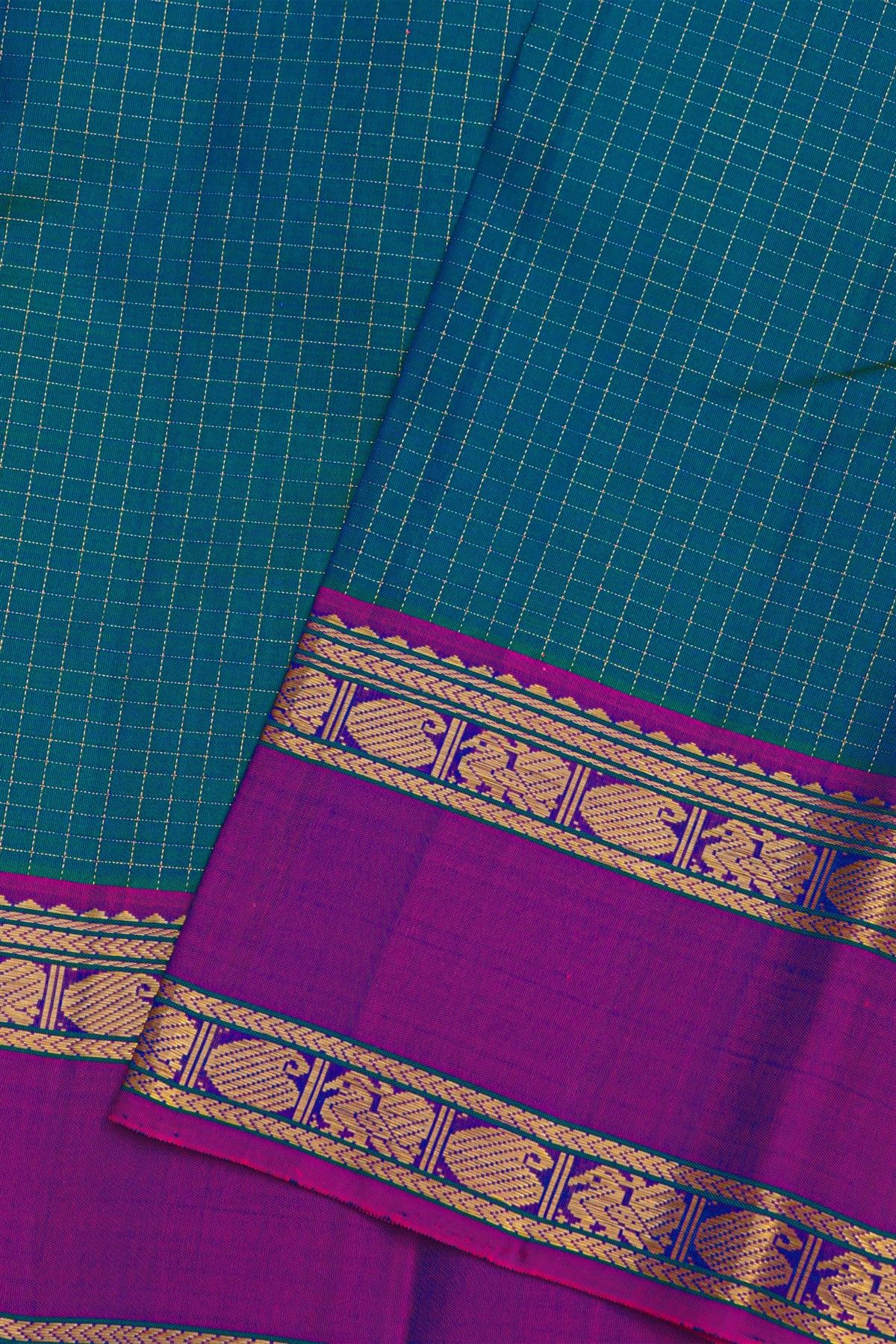 Kancheepuram Silk Peacock Blue Saree With Zari Checks Body Gap Border