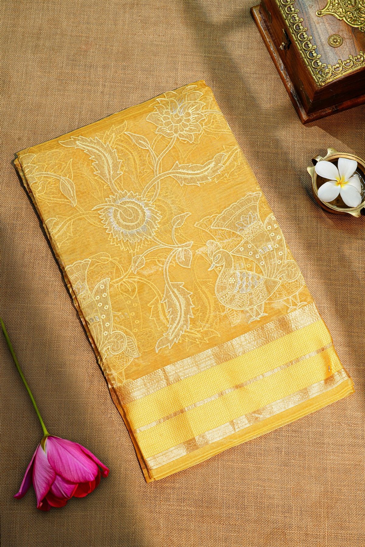 Fancy Kora Light Orange Saree With Florals And Peacocks In Thread Work Body And Contrast Zig-Zag Lines Border And Zari Lines Pallu