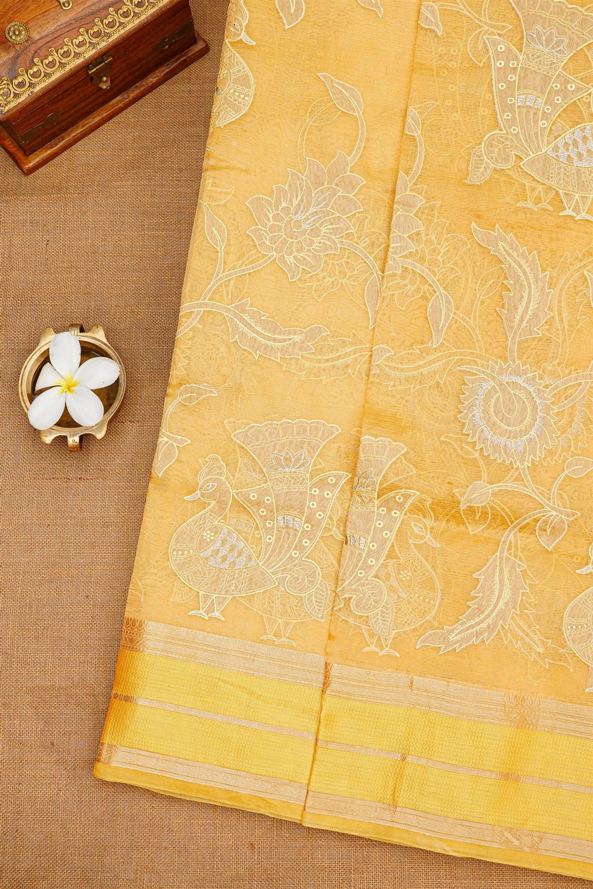 Fancy Kora Light Orange Saree With Florals And Peacocks In Thread Work Body And Contrast Zig-Zag Lines Border And Zari Lines Pallu
