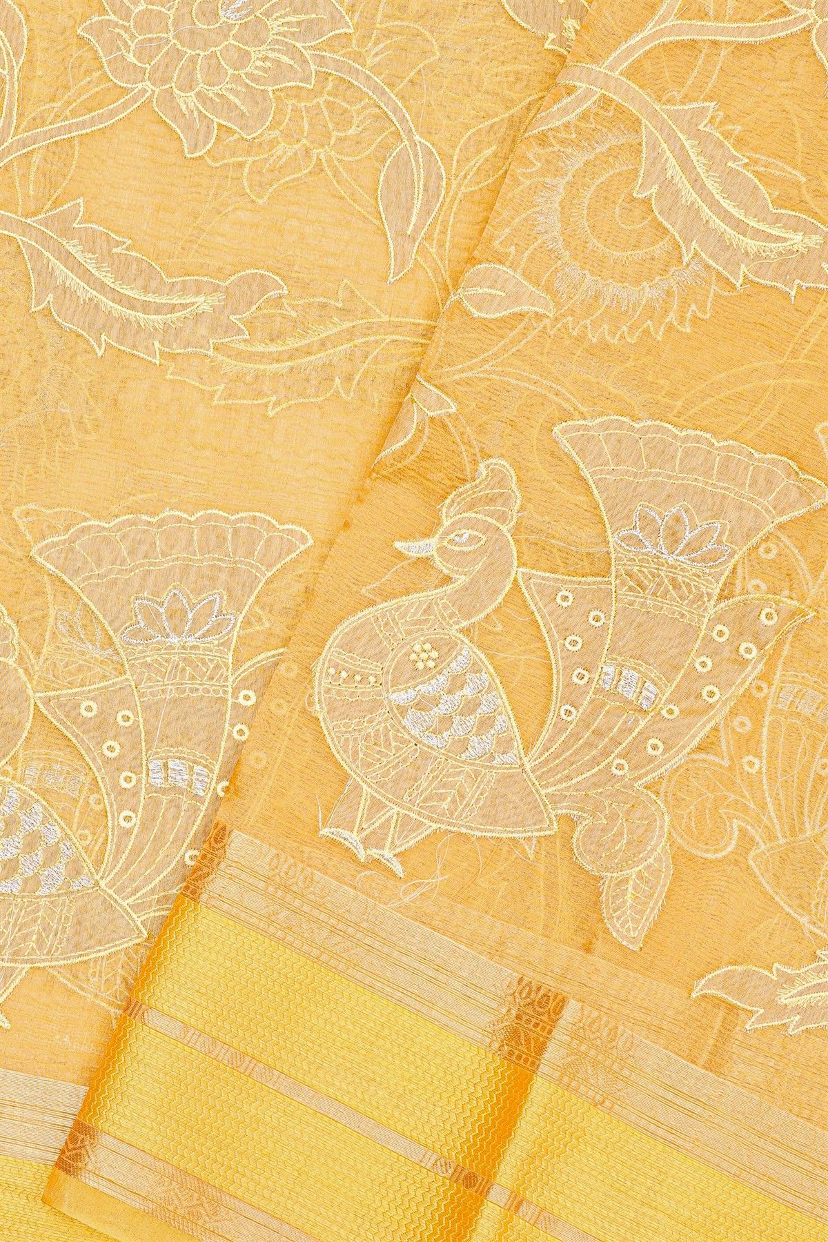 Fancy Kora Light Orange Saree With Florals And Peacocks In Thread Work Body And Contrast Zig-Zag Lines Border And Zari Lines Pallu