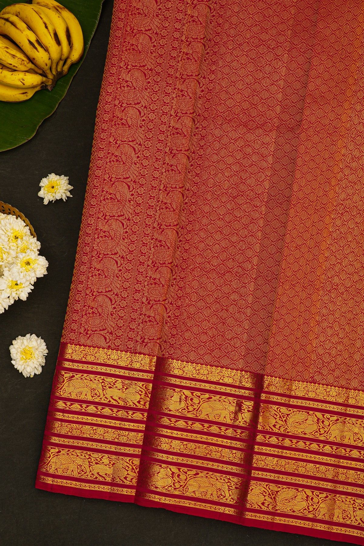 Kancheepuram Silk Magenta Saree With Elephants And Yalis Border