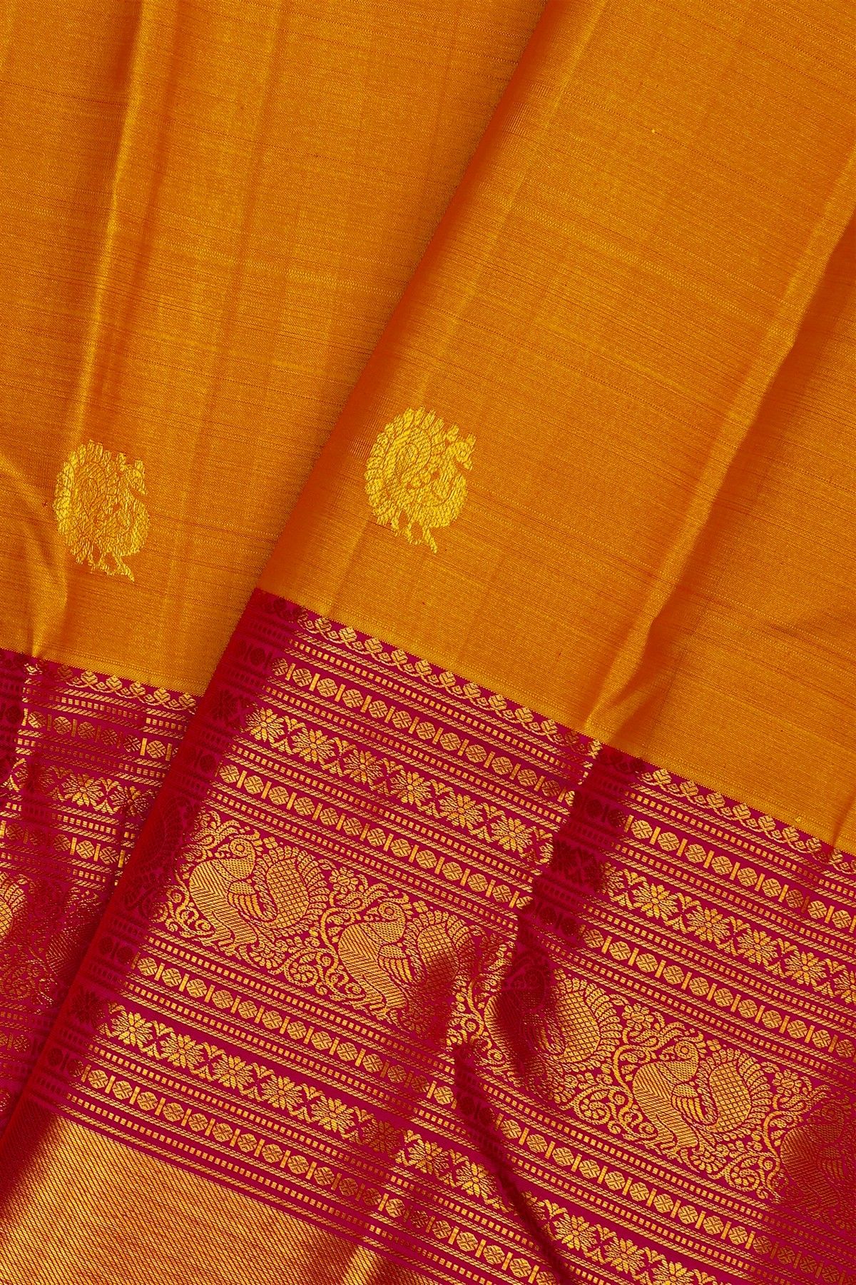 Kancheepuram Silk Mustard Saree With Yalis And Peacock Border