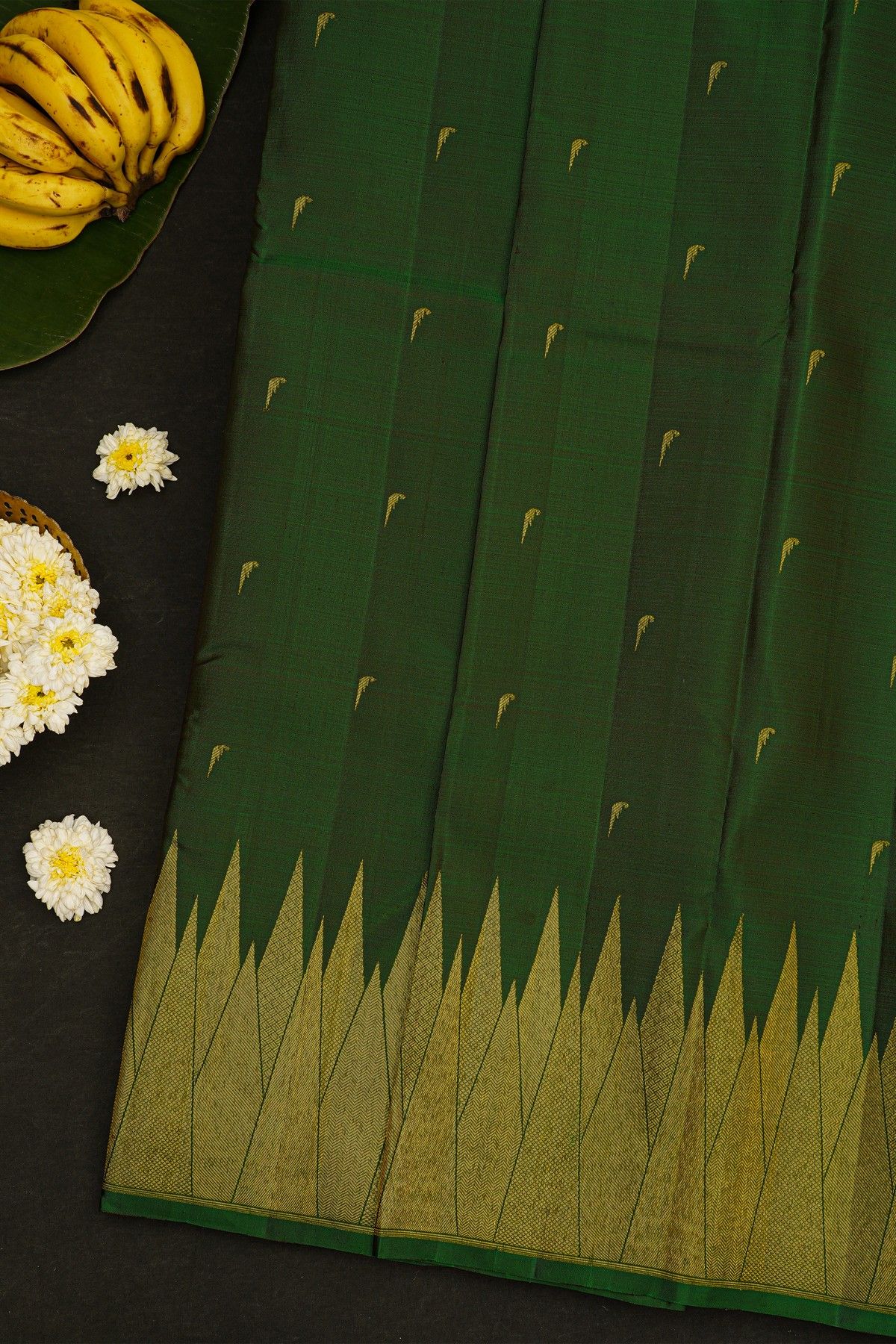 Kancheepuram Silk Bottle Green Saree With Muniya Buttis Body And Temple Border