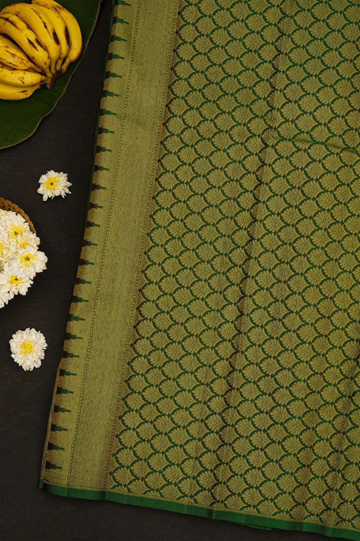 Kancheepuram Silk Bottle Green Saree With Muniya Buttis Body And Temple Border