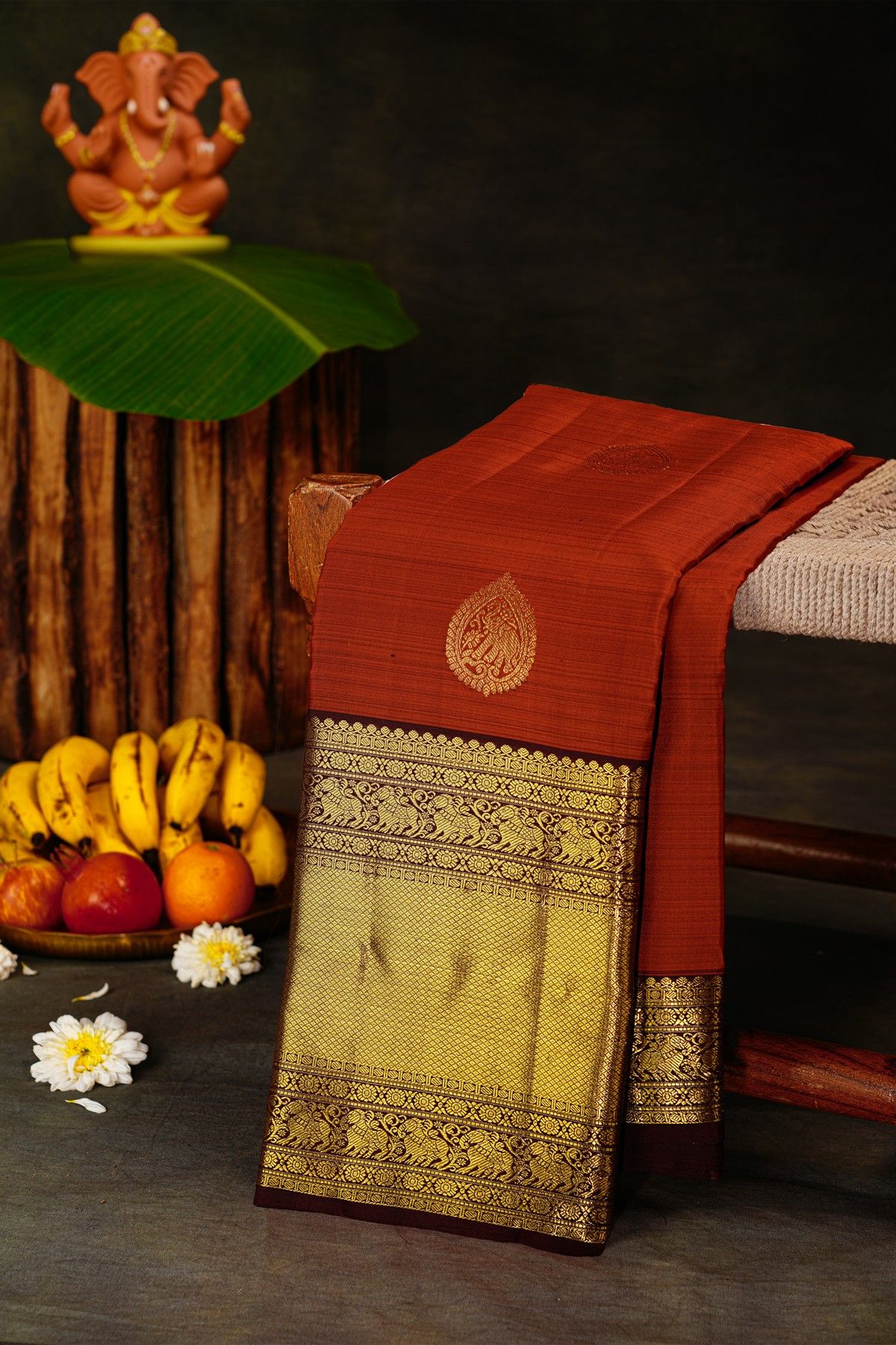Kancheepuram Silk Rust Saree With Diamond And Yalis Contrast Border