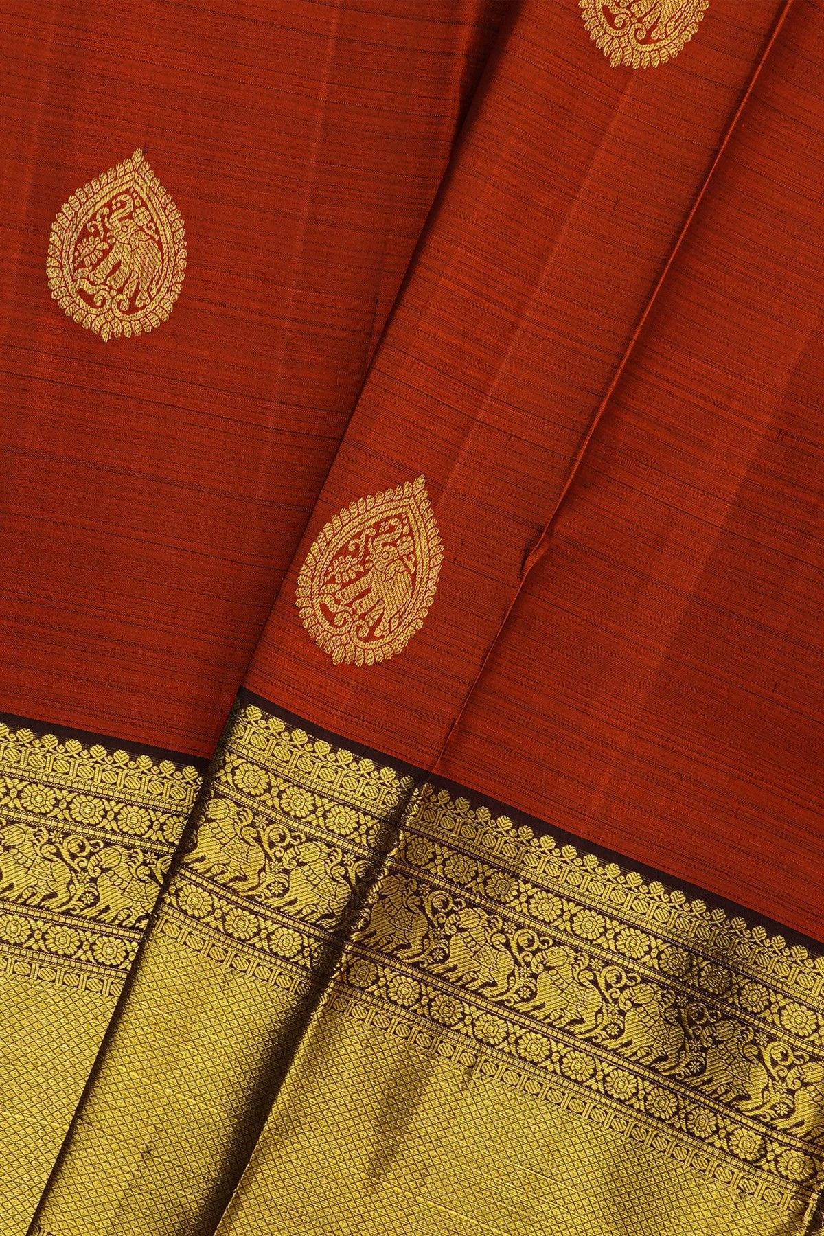 Kancheepuram Silk Rust Saree With Diamond And Yalis Contrast Border