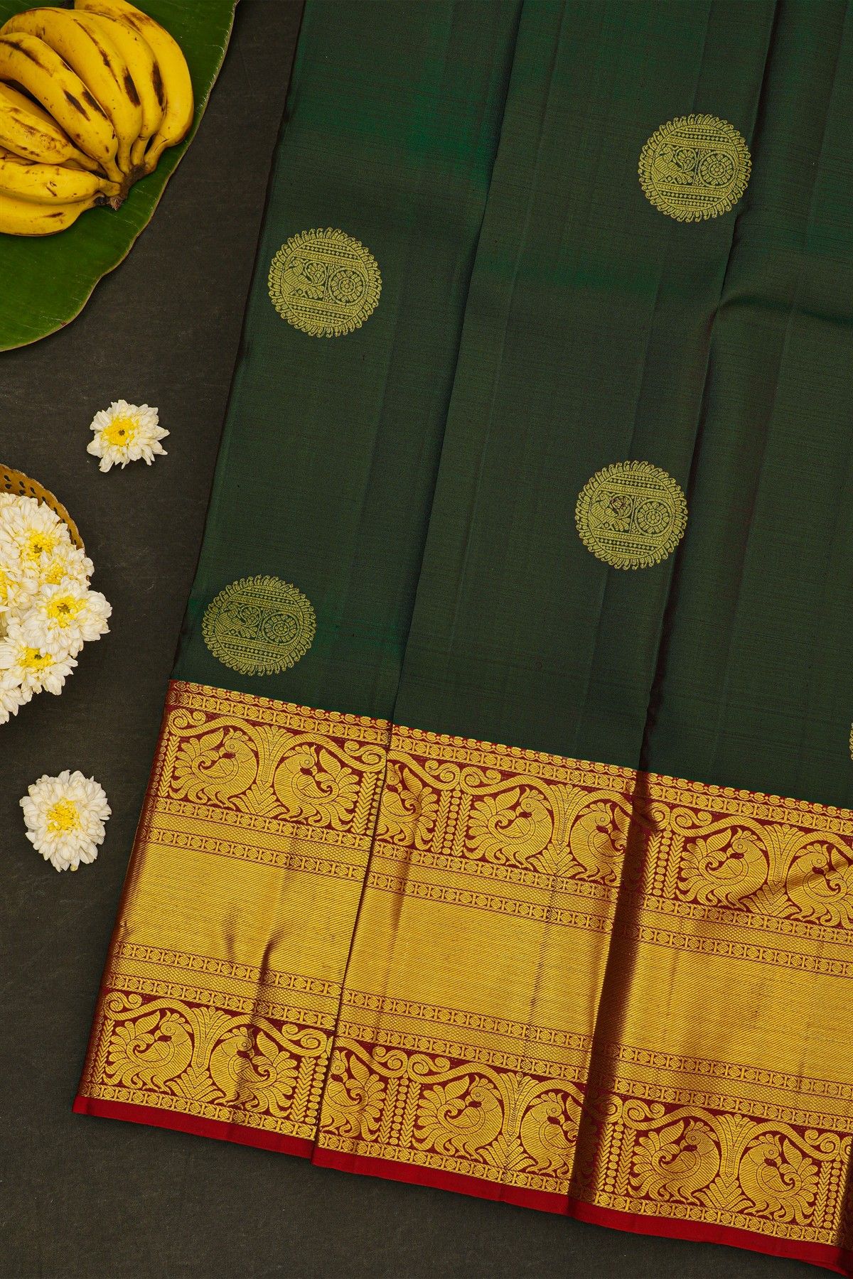 Kancheepuram Silk Bottle Green Saree With Mayil And Annam Korvai Border