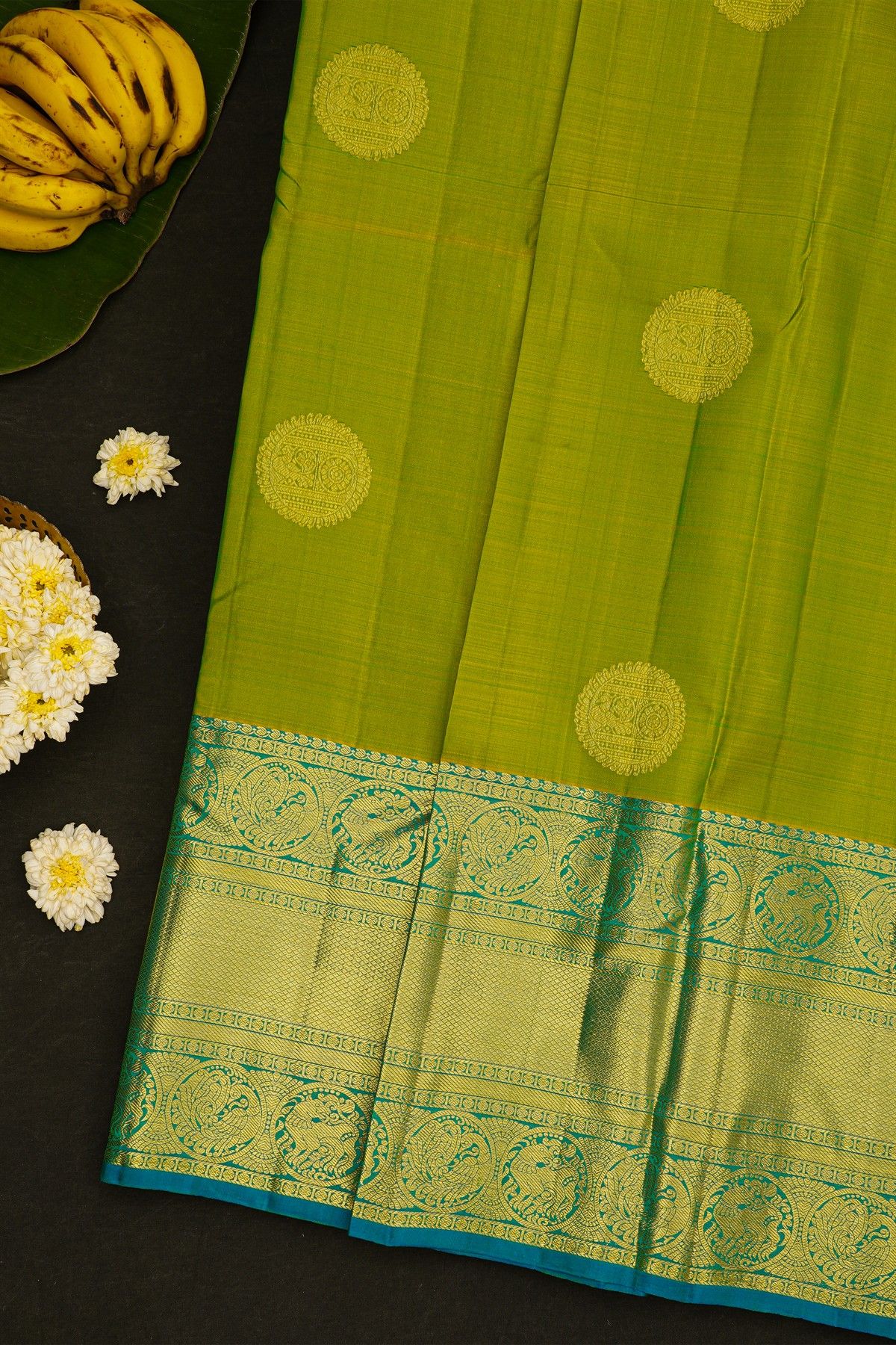Kancheepuram Silk Parrot Green Saree With Peacock And Yalis Border