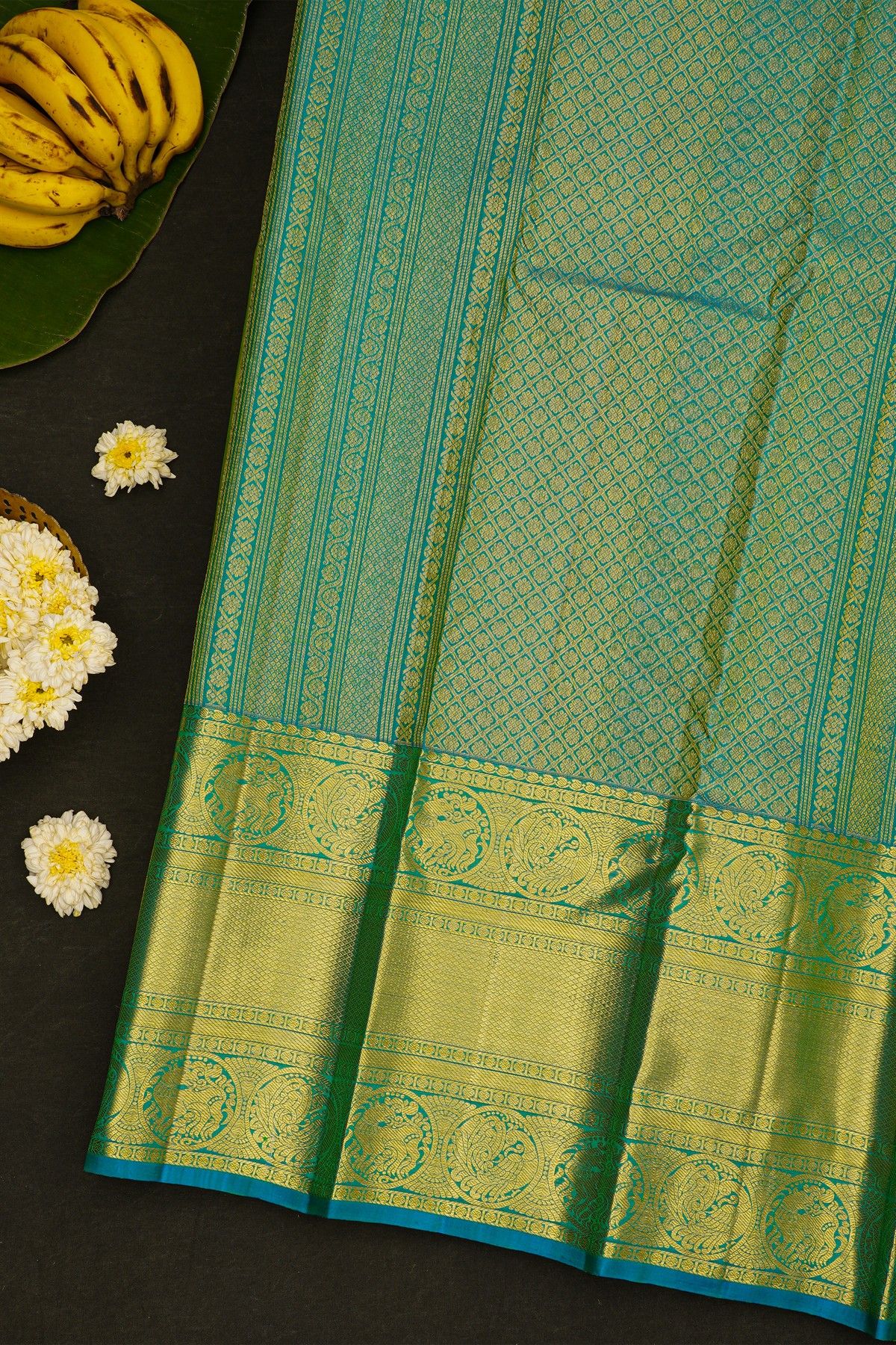 Kancheepuram Silk Parrot Green Saree With Peacock And Yalis Border