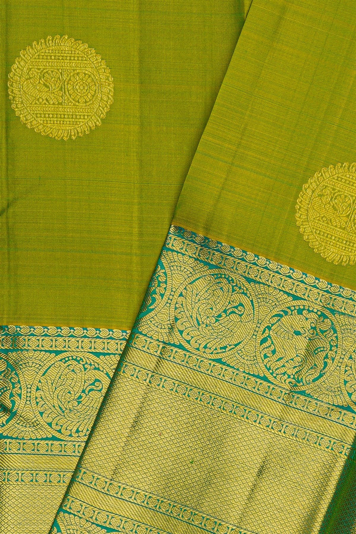 Kancheepuram Silk Parrot Green Saree With Peacock And Yalis Border