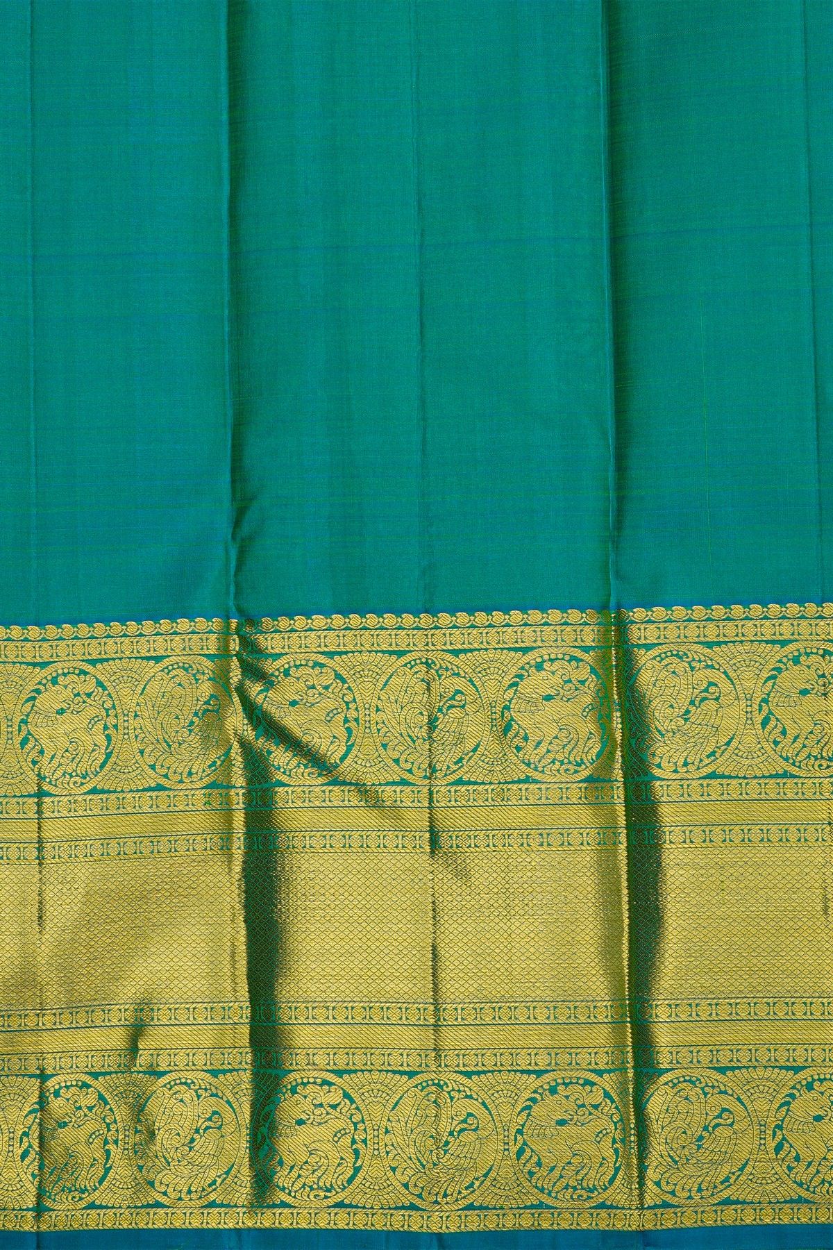 Kancheepuram Silk Parrot Green Saree With Peacock And Yalis Border
