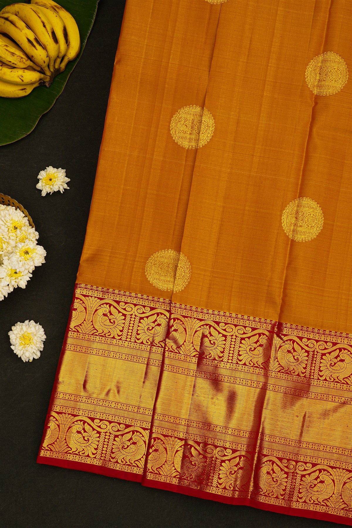Kancheepuram Silk Mustard Saree With Big Buttis Body Long Contrast Border