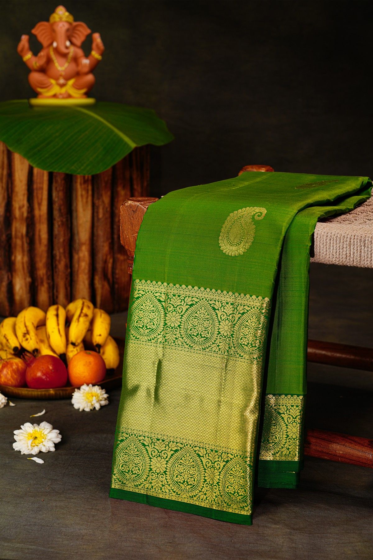 Kancheepuram Silk Parrot Green Saree With Mango Paisley Body And Self Border