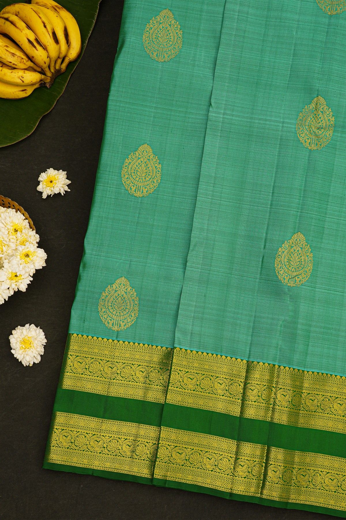 Kancheepuram Silk Sea Green Saree With Paisley Motifs Body Gap Border