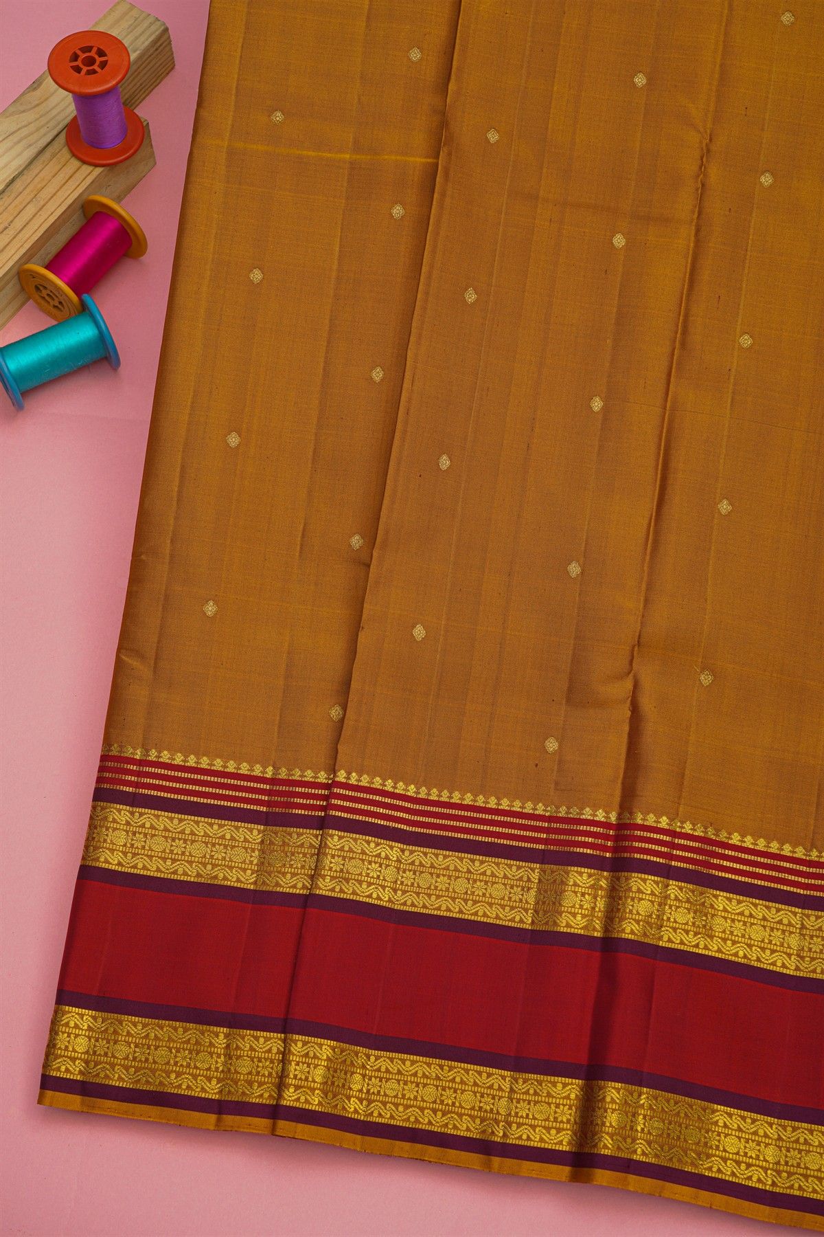 Kancheepuram Silk Light Brown Saree With Tikki Buttis Body And Gap Border