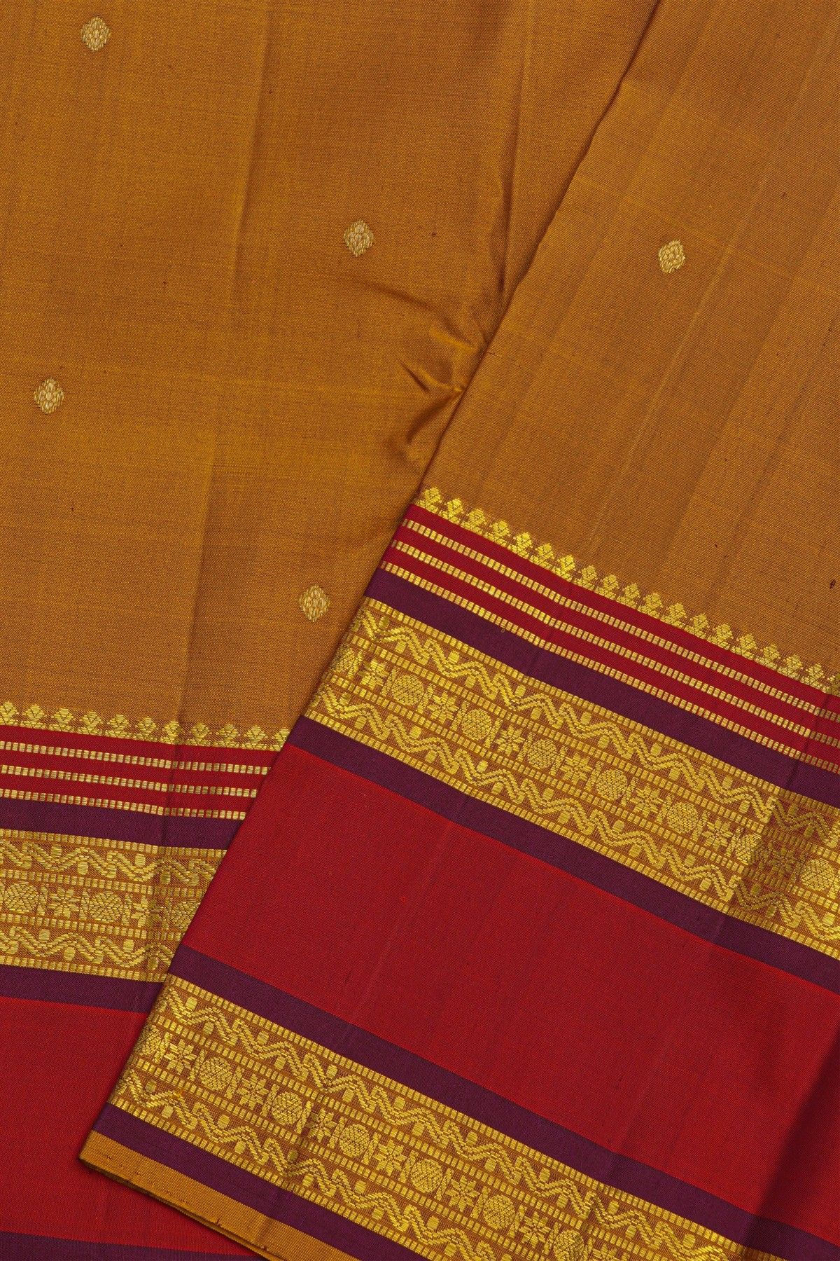 Kancheepuram Silk Light Brown Saree With Tikki Buttis Body And Gap Border