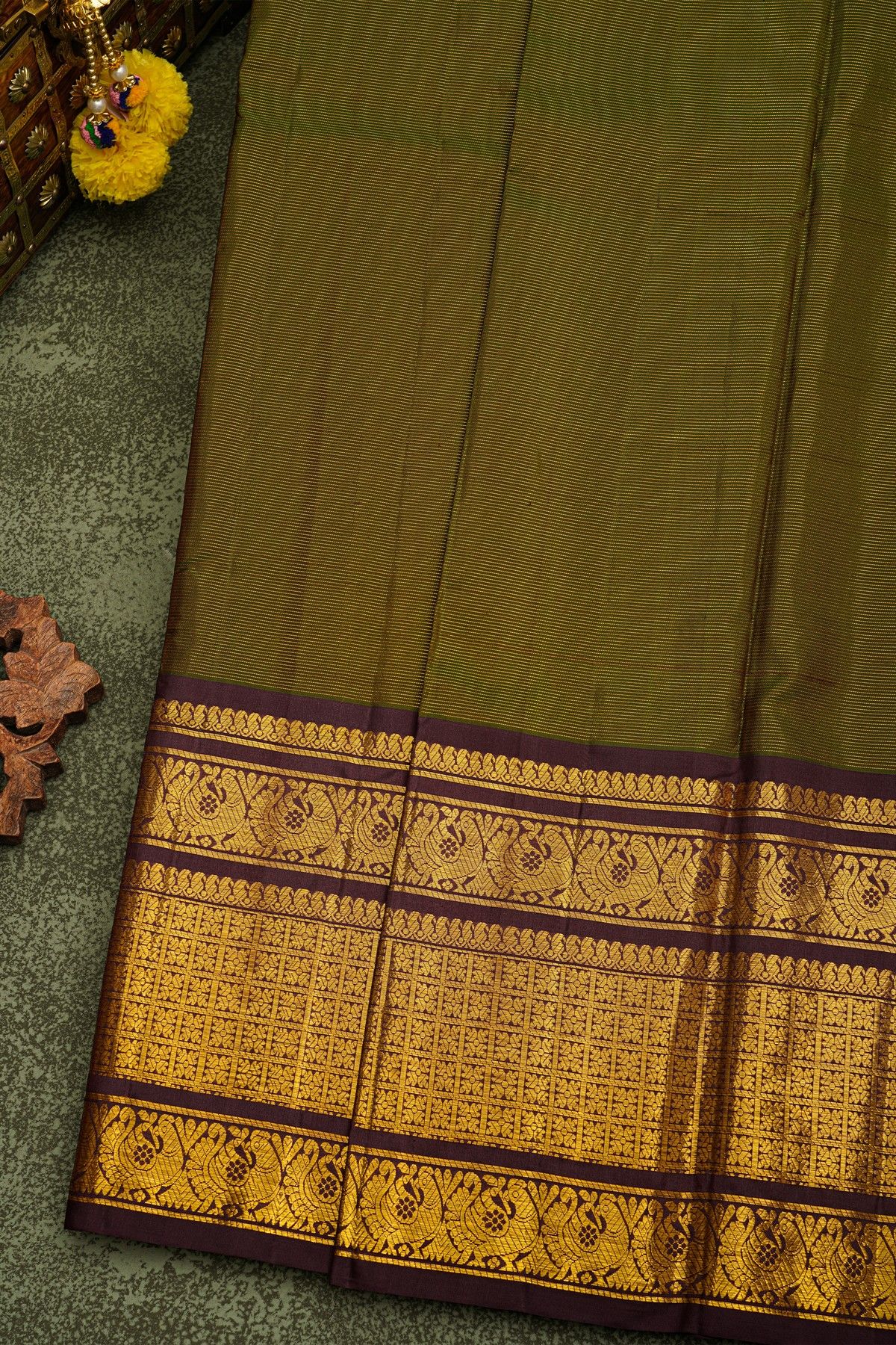 Kancheepuram Silk Mehendi Green Saree With Zari Lines Body And Contrast Florals And Peacocks Border