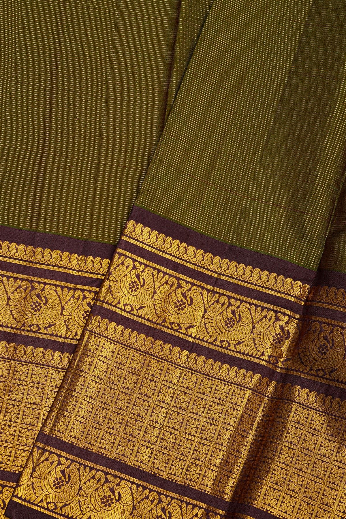 Kancheepuram Silk Mehendi Green Saree With Zari Lines Body And Contrast Florals And Peacocks Border