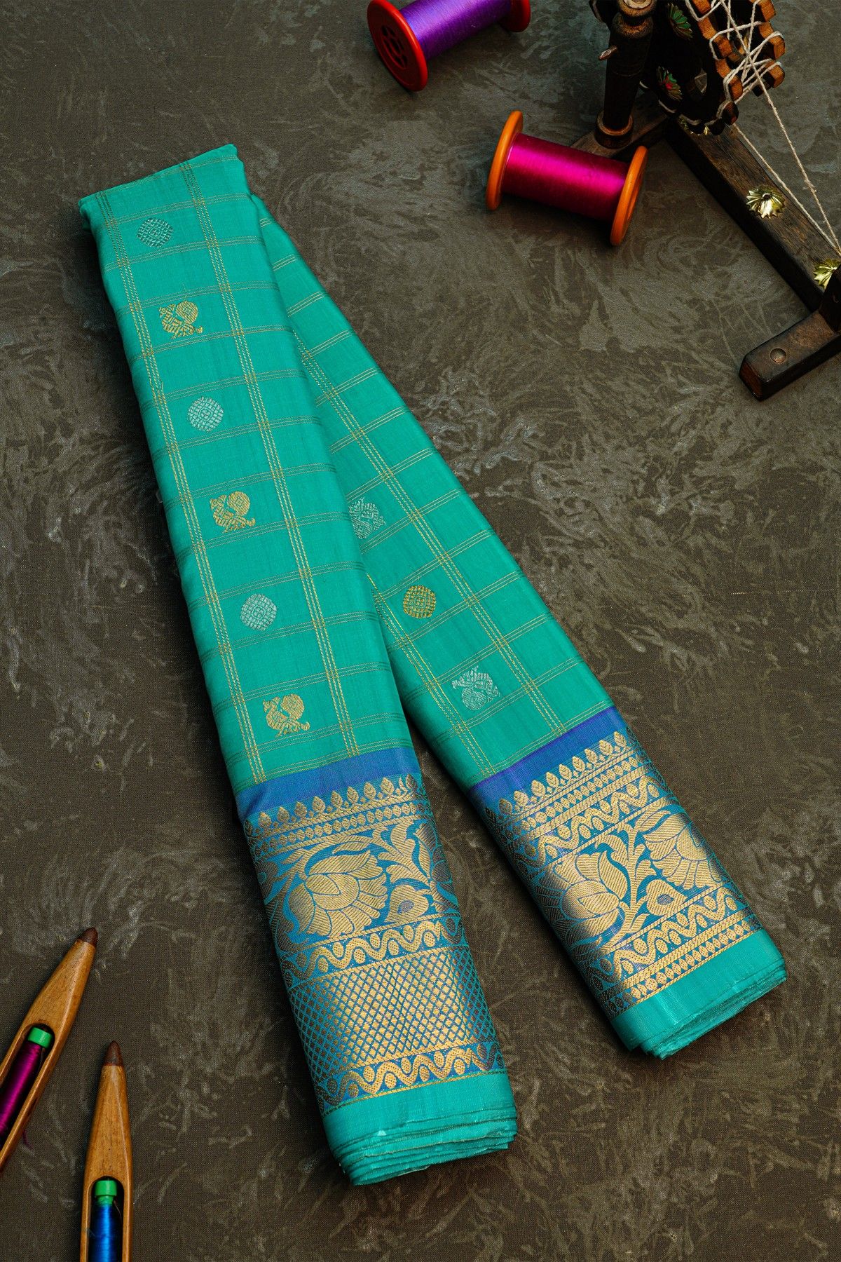 Gadwal Silk Sea Blue Saree With Florals And Peacocks In Zari Checks Body